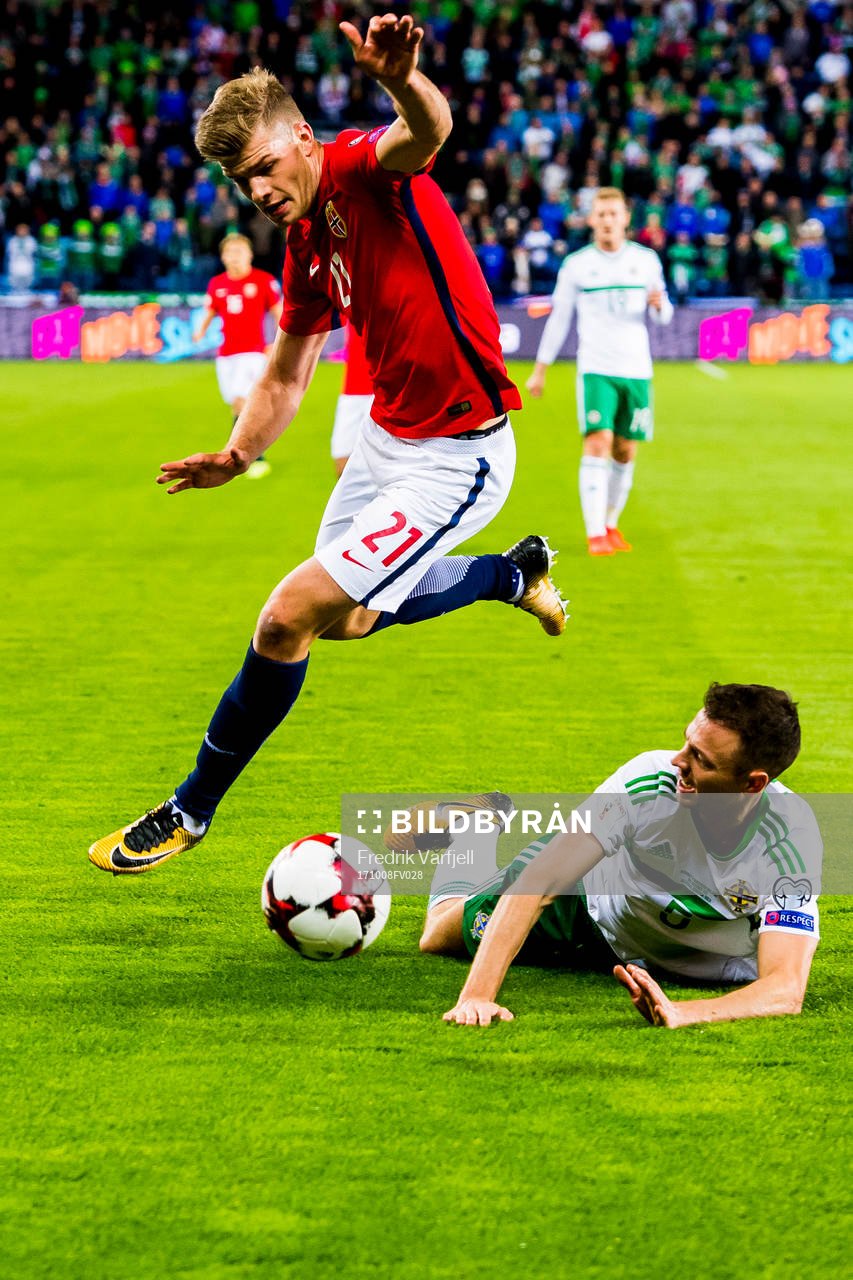 Alexander Sørloth of Norway and Jonny Evans of Northern