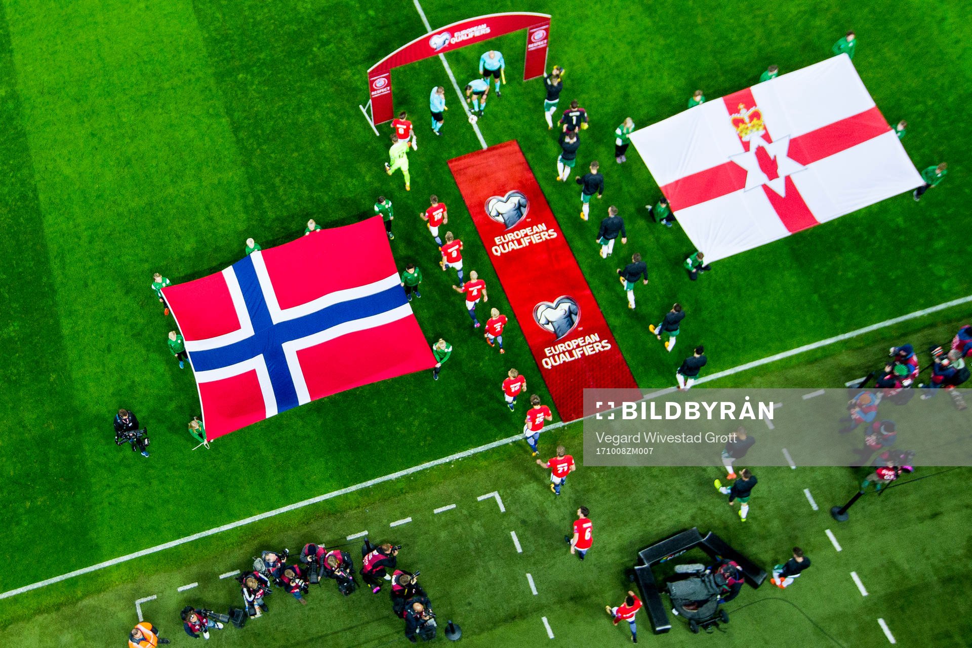 Players of both teams enter the pitch ahead the FIFA World