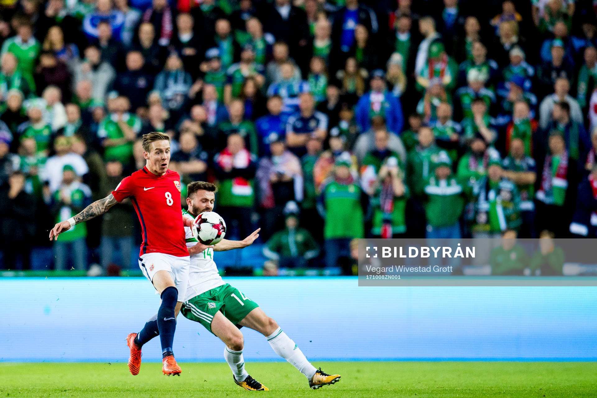 Stefan Johansen of Norway and Stuart Dallas of Northern