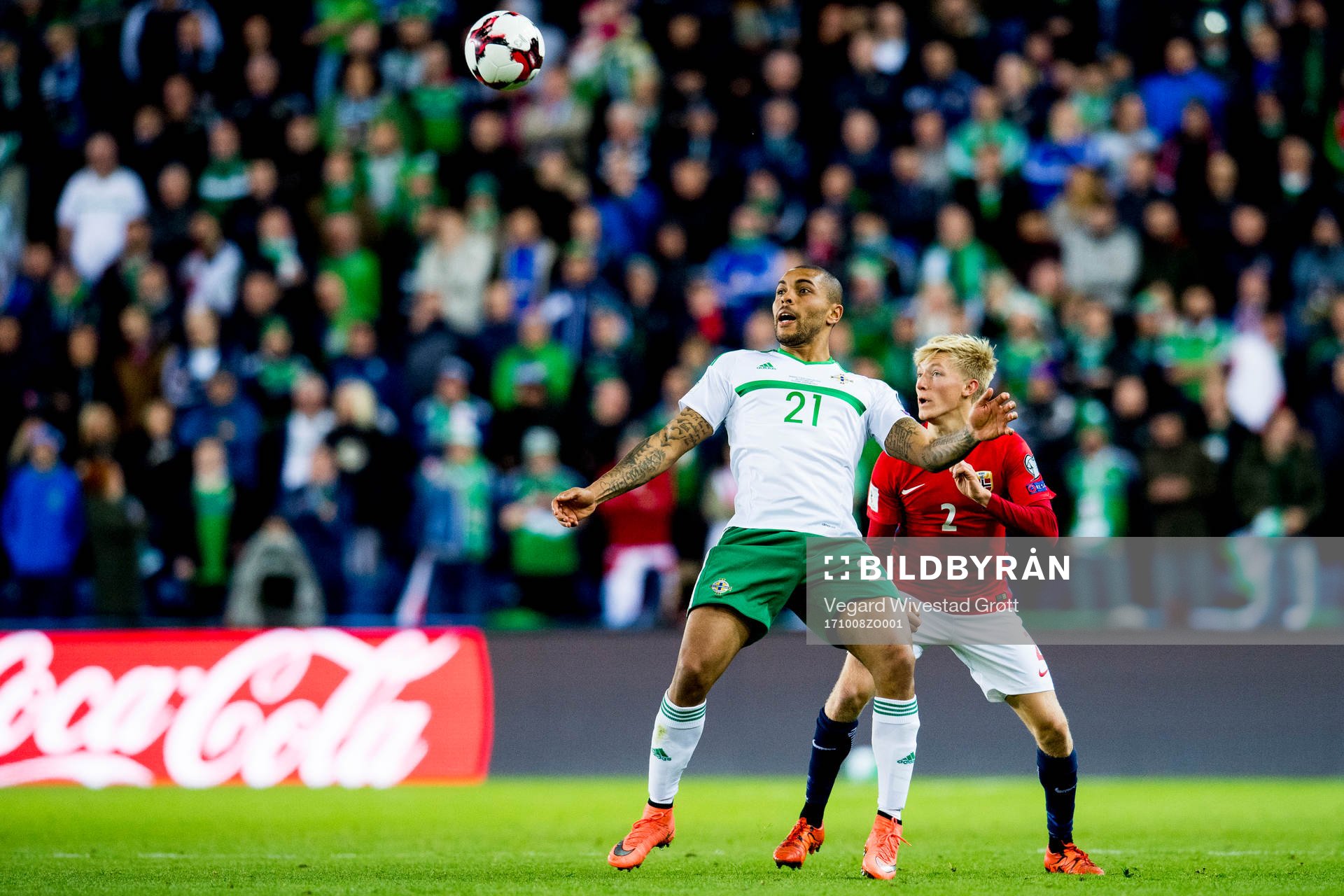 Josh Magennis of Northern Ireland and Birger Meling of Norway during the FIFA World Cup Qualifier match between Norway and Northern Ireland on October 8, 2017 in Oslo.