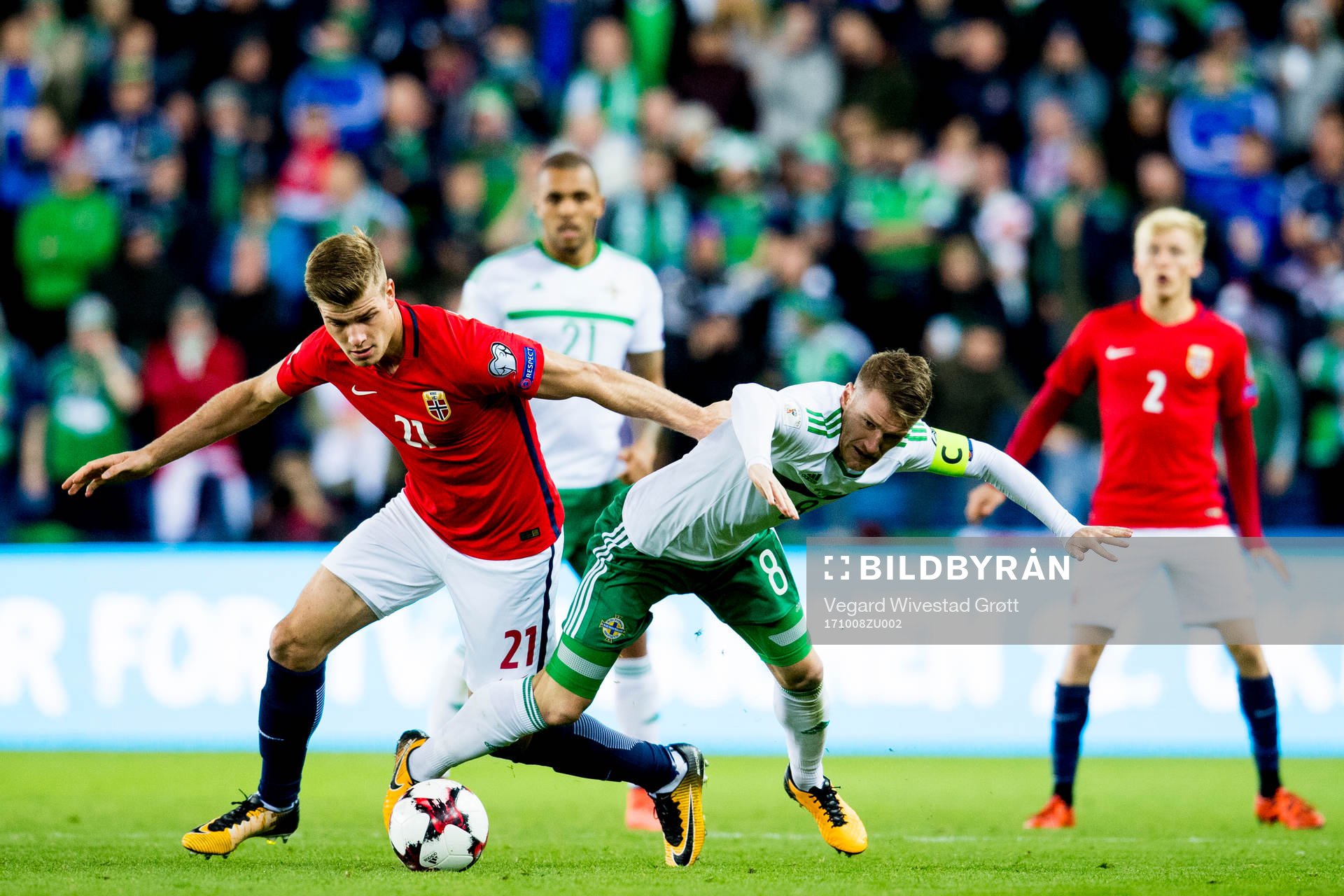 Alexander Sørloth of Norway and Steven Davis of Northern