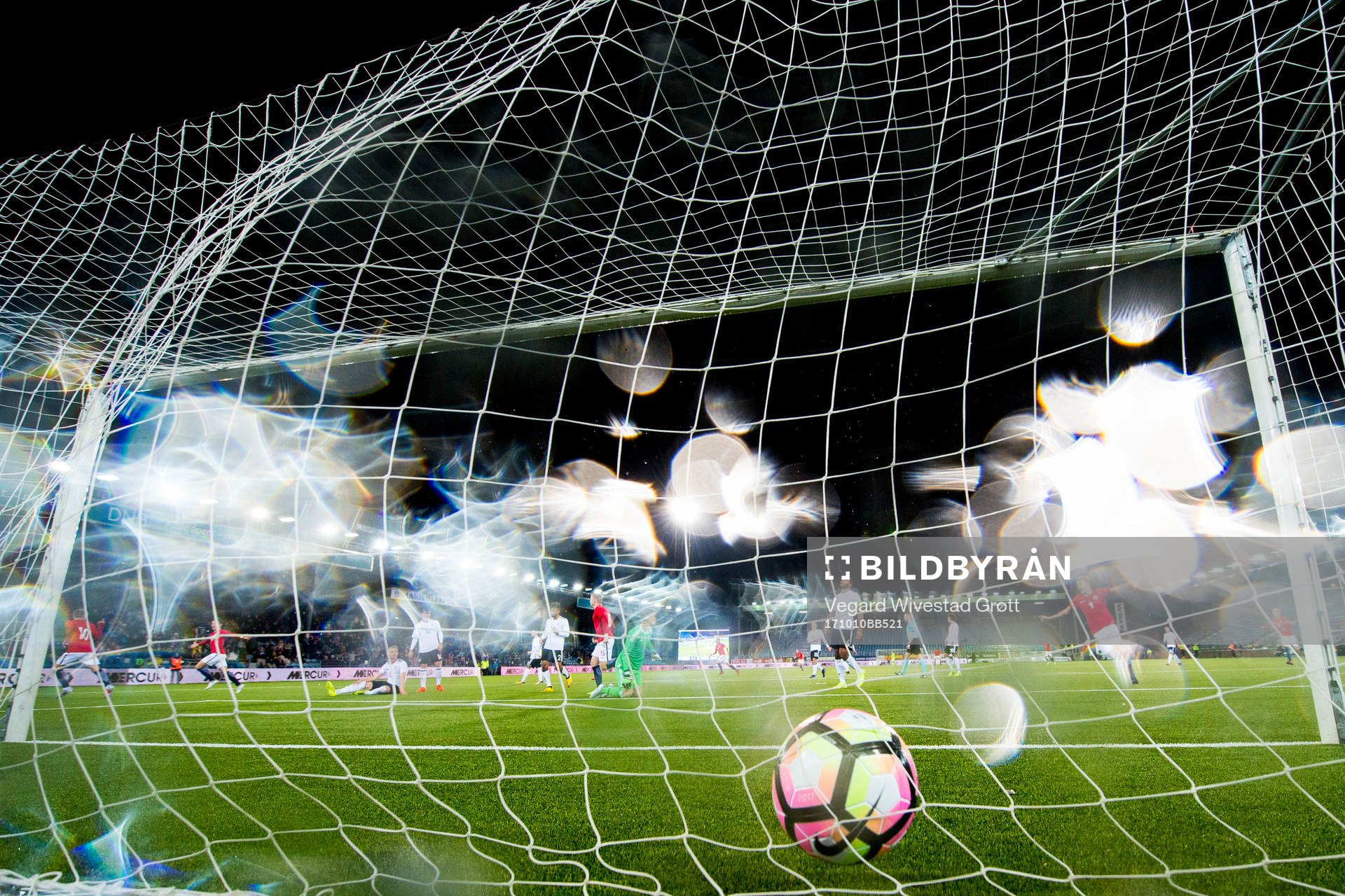 Martin Ødegaard of Norway scores 2-1 behind goalkeeper
