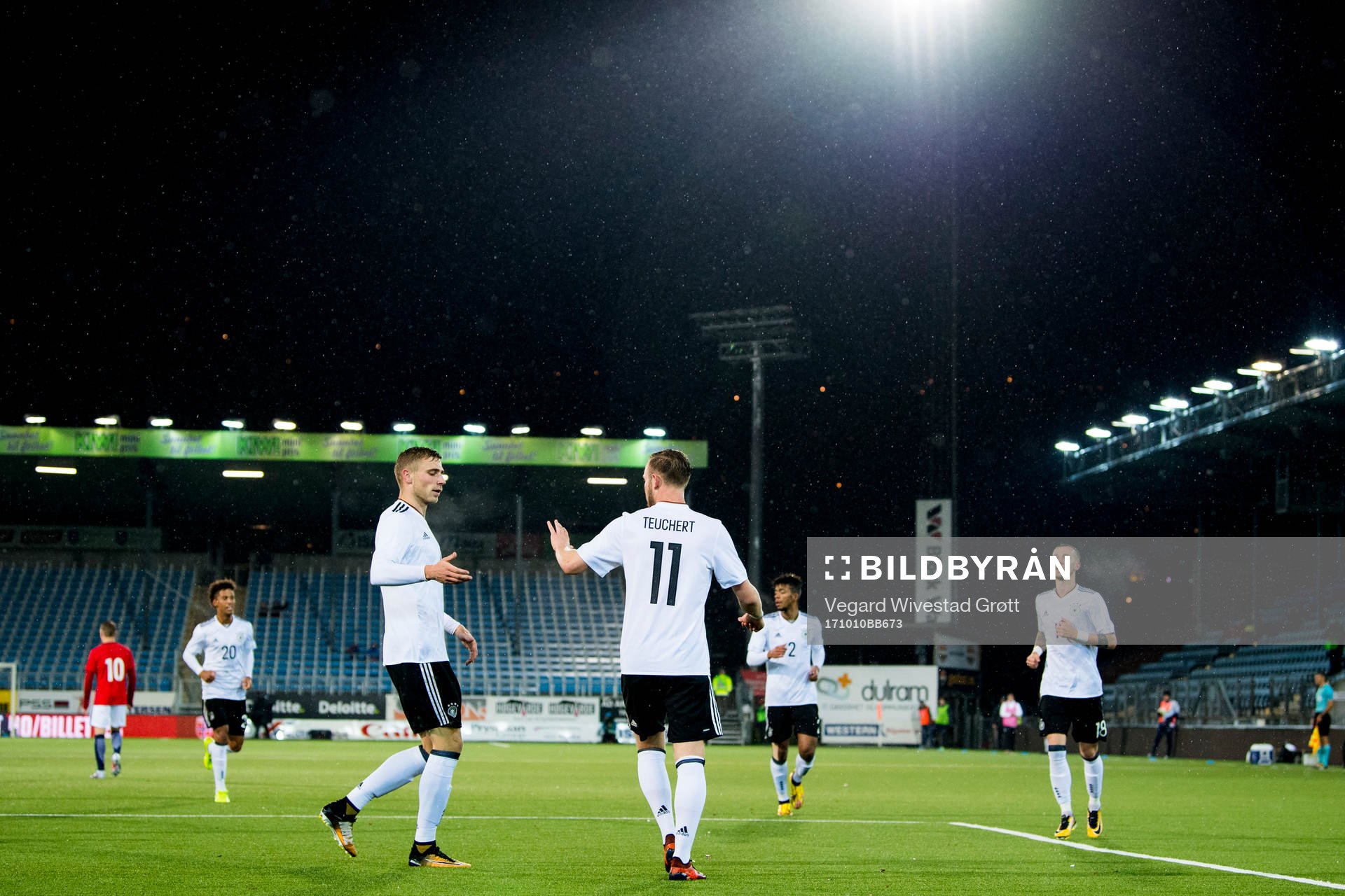 Cedric Teuchert of Germany celebrates with teammates after scoring 0-1 during the UEFA European Under-21 Qualifier match between Norway and Germany on October 10, 2017 in Drammen.