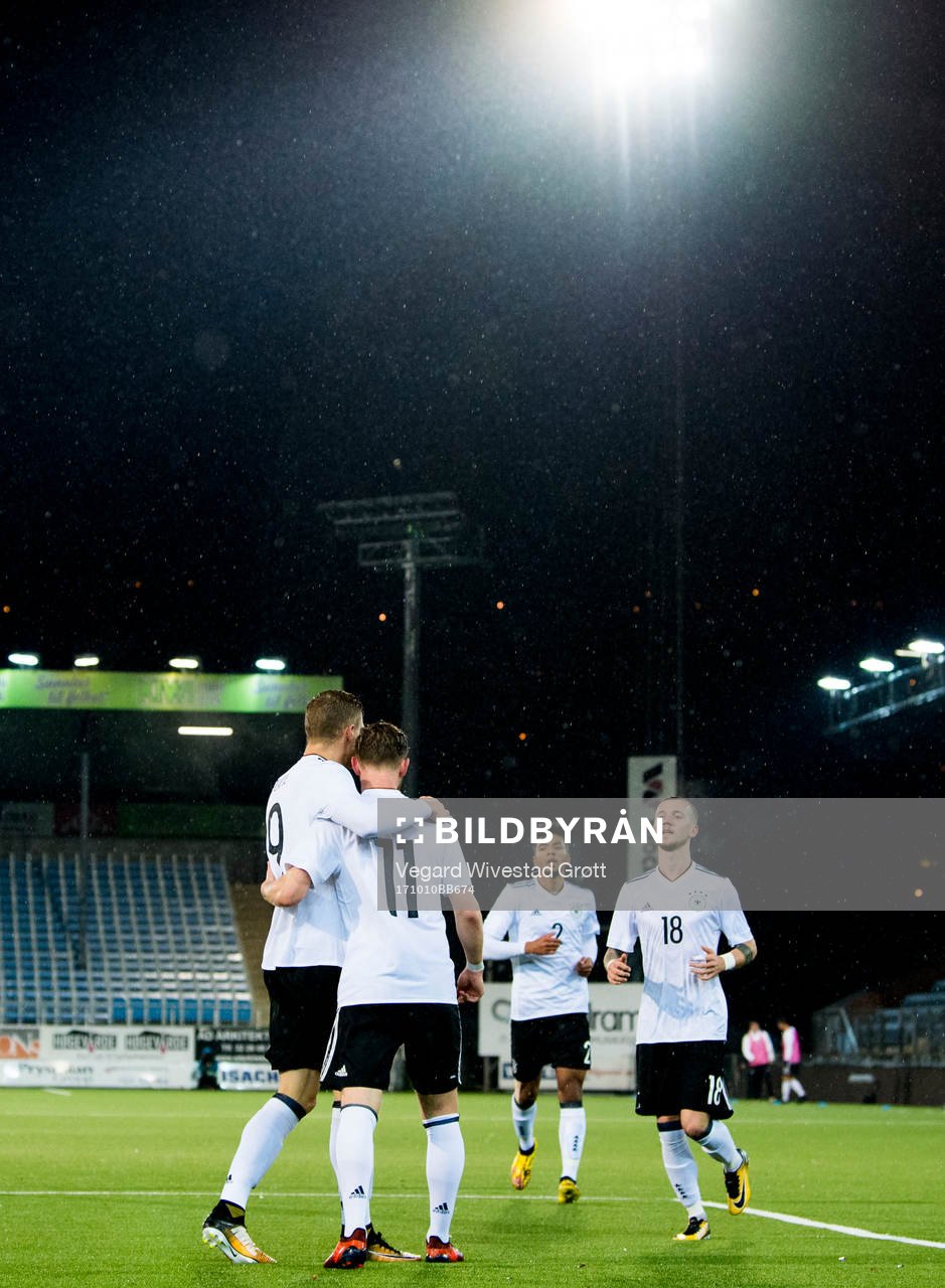 Cedric Teuchert of Germany celebrates with teammates after scoring 0-1 during the UEFA European Under-21 Qualifier match between Norway and Germany on October 10, 2017 in Drammen.