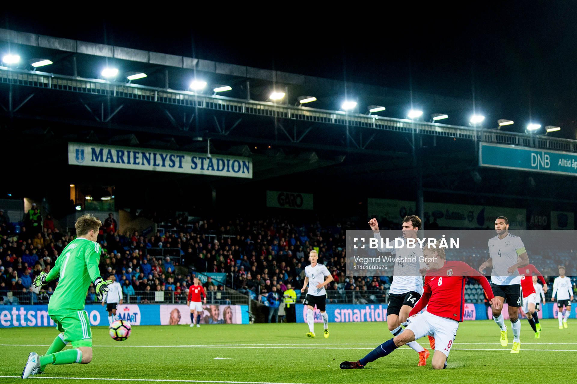 Morten Thorsby of Norway scores 3-1 behind goalkeeper