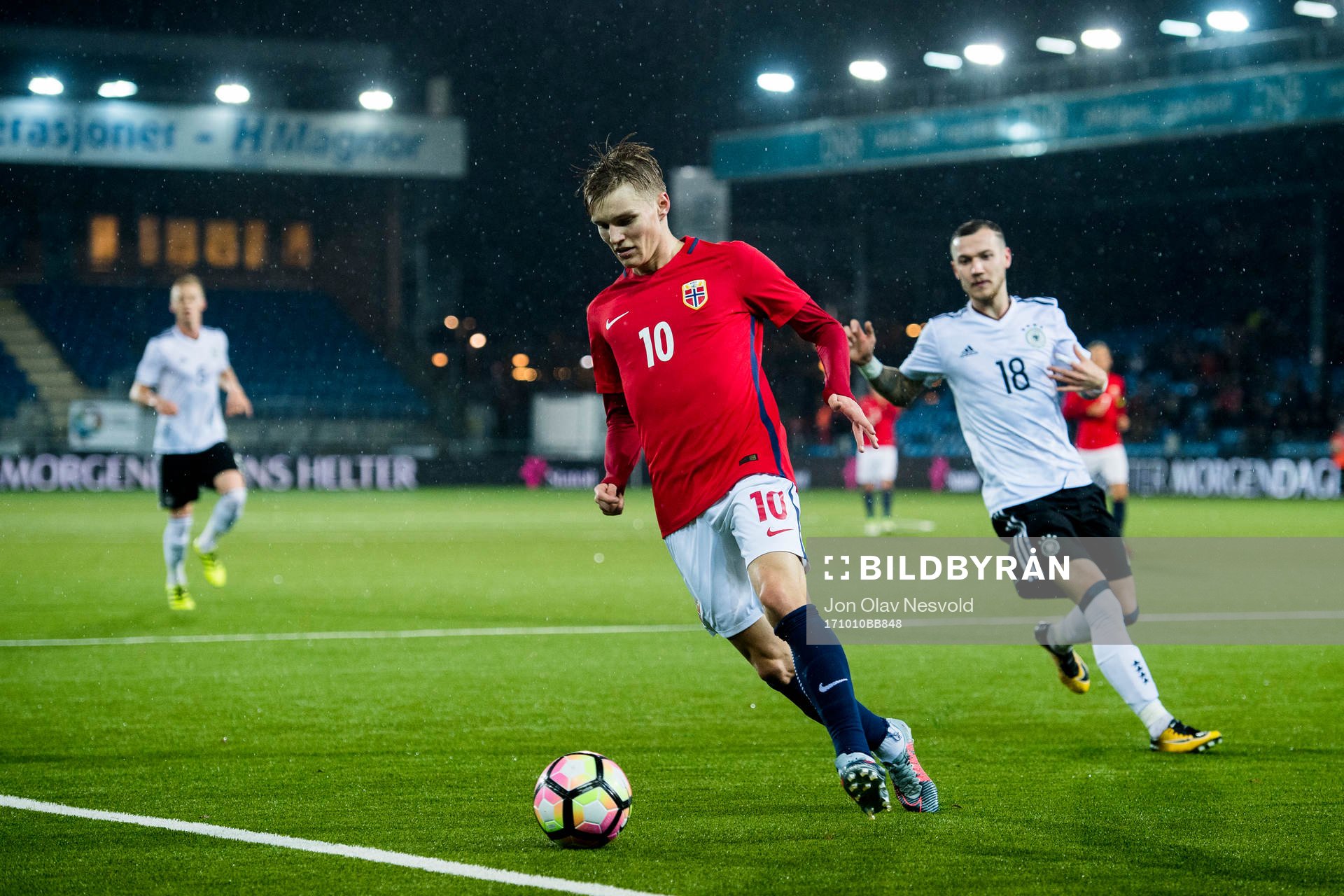 Martin Ødegaard of Norway and Marcel Hartel of Germany