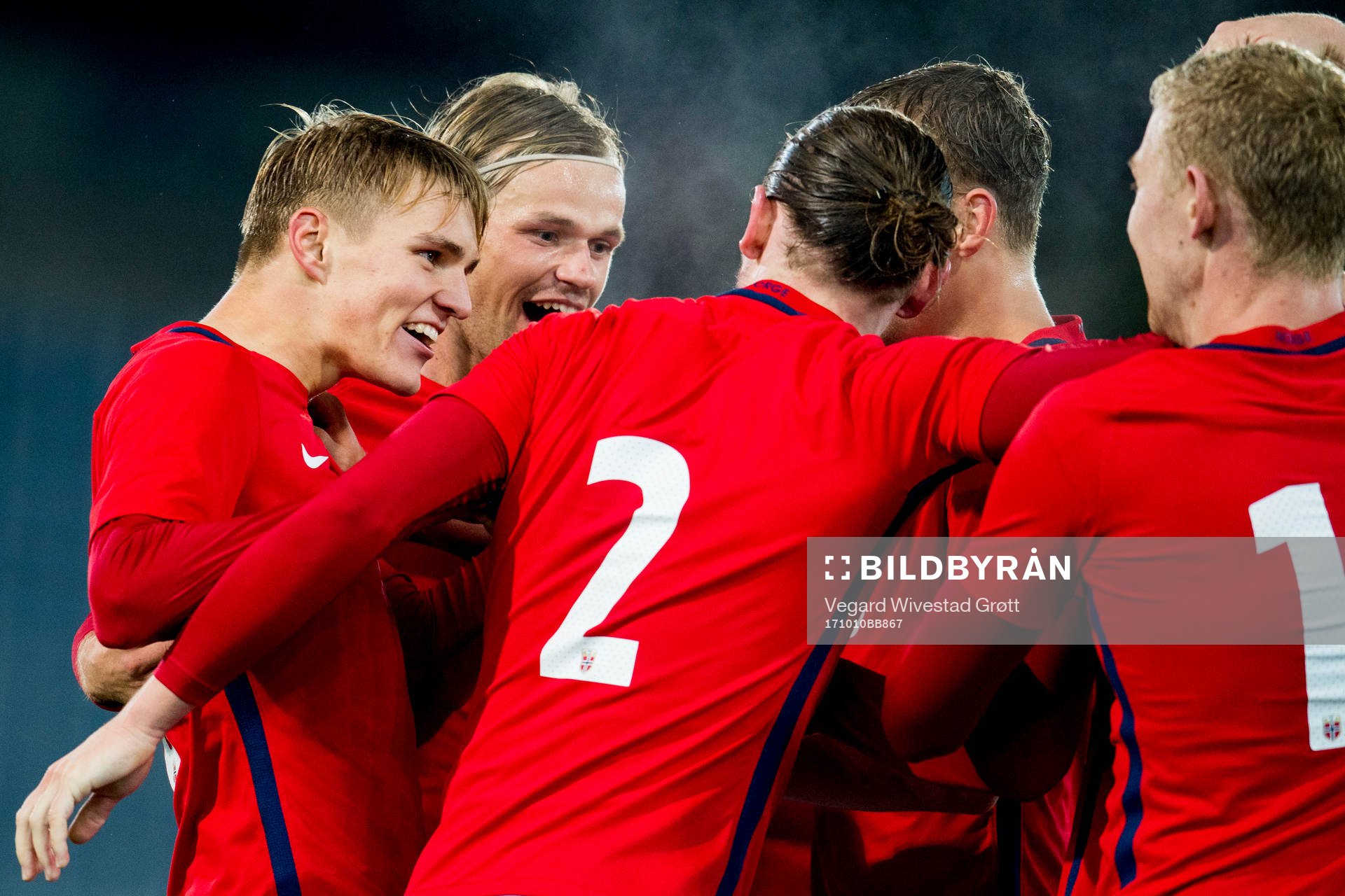 Martin Ødegaard of Norway celebrates with teammates