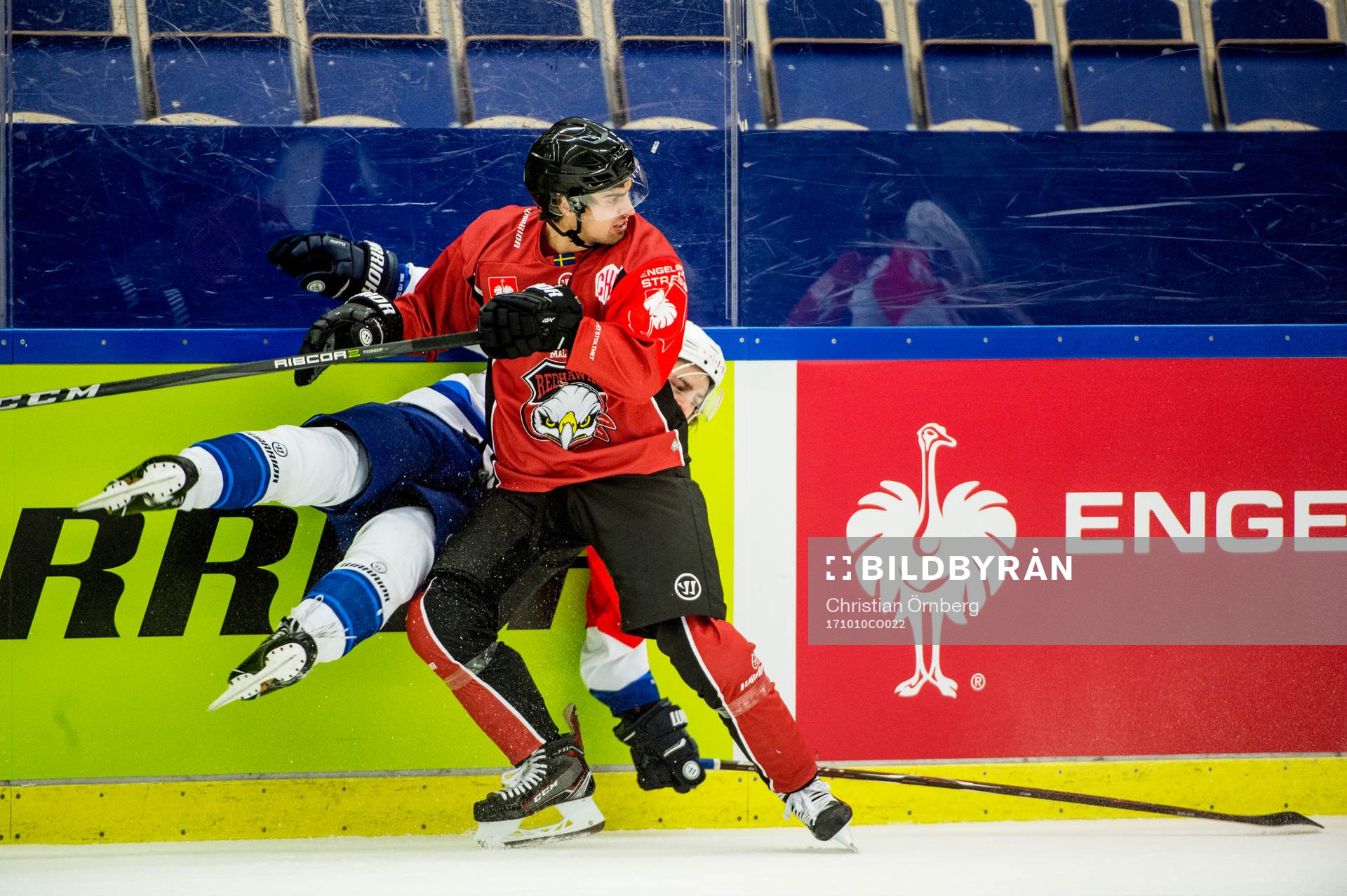 Nils Andersson of Malmö Redhawks and Alexandre Mallet of