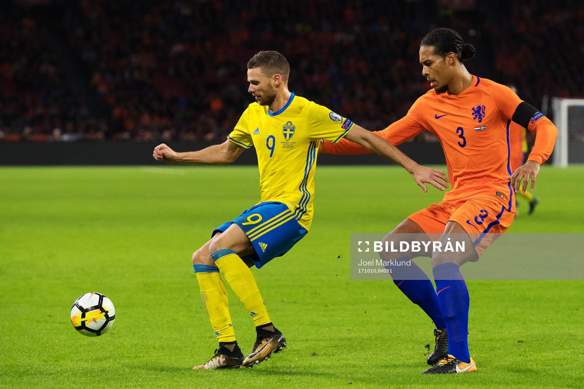 Sveriges Marcus Berg och Hollands Virgil Van Dijk