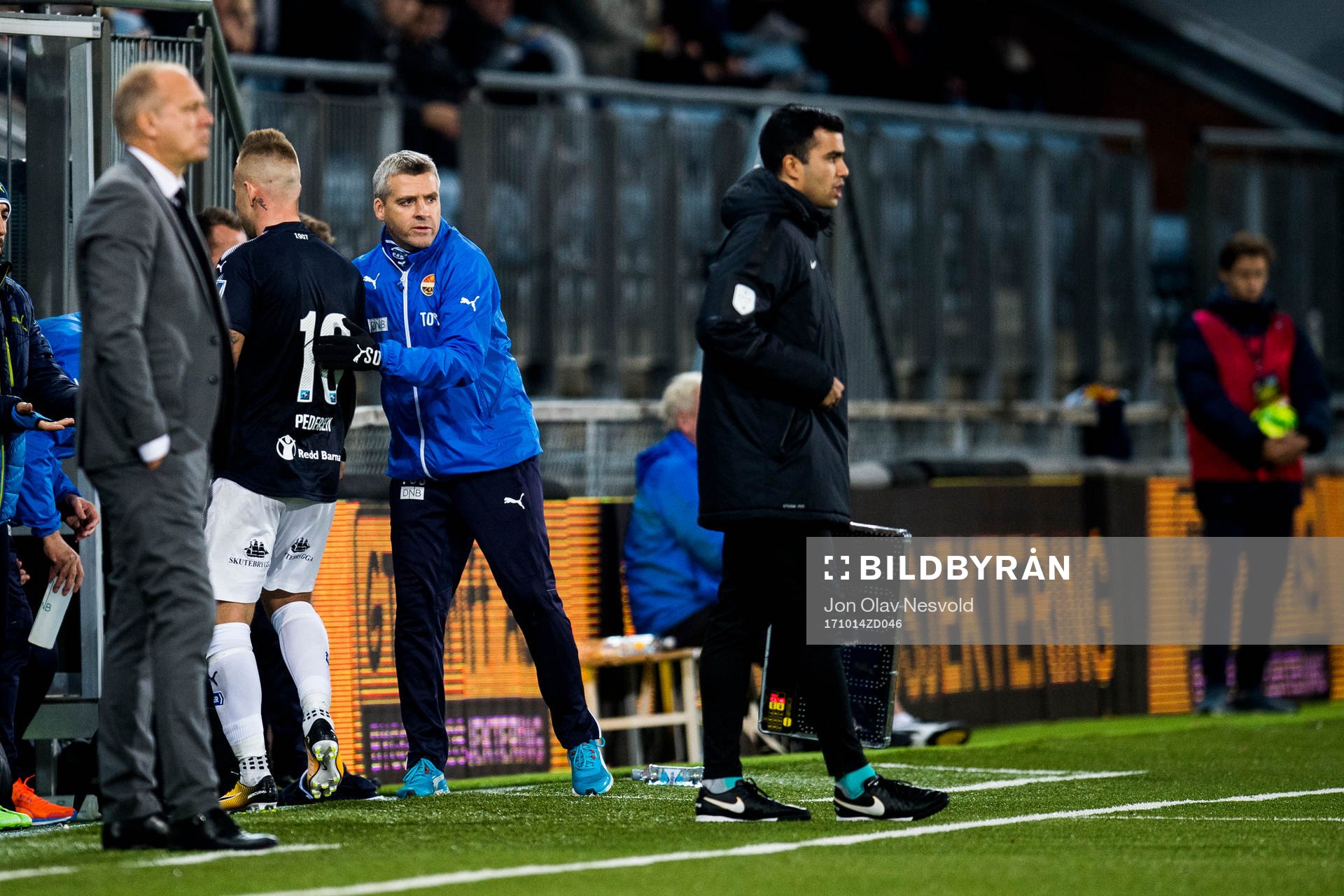 Marcus Pedersen of Strømsgodset and Tor Ole Skullerud,