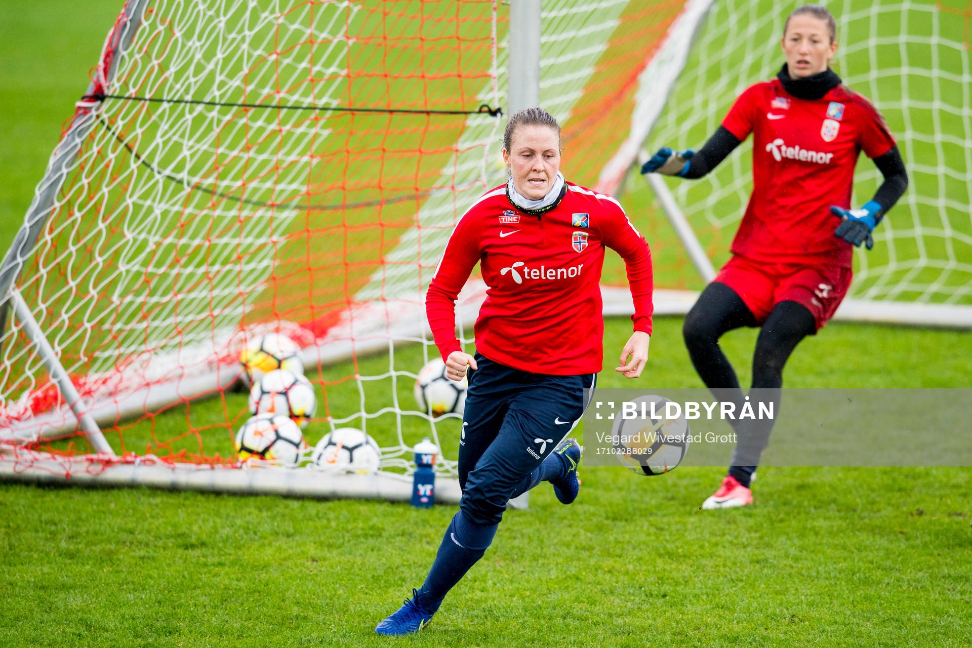 Isabell Herlovsen and goalkeeper Cecilie Fiskerstrand of