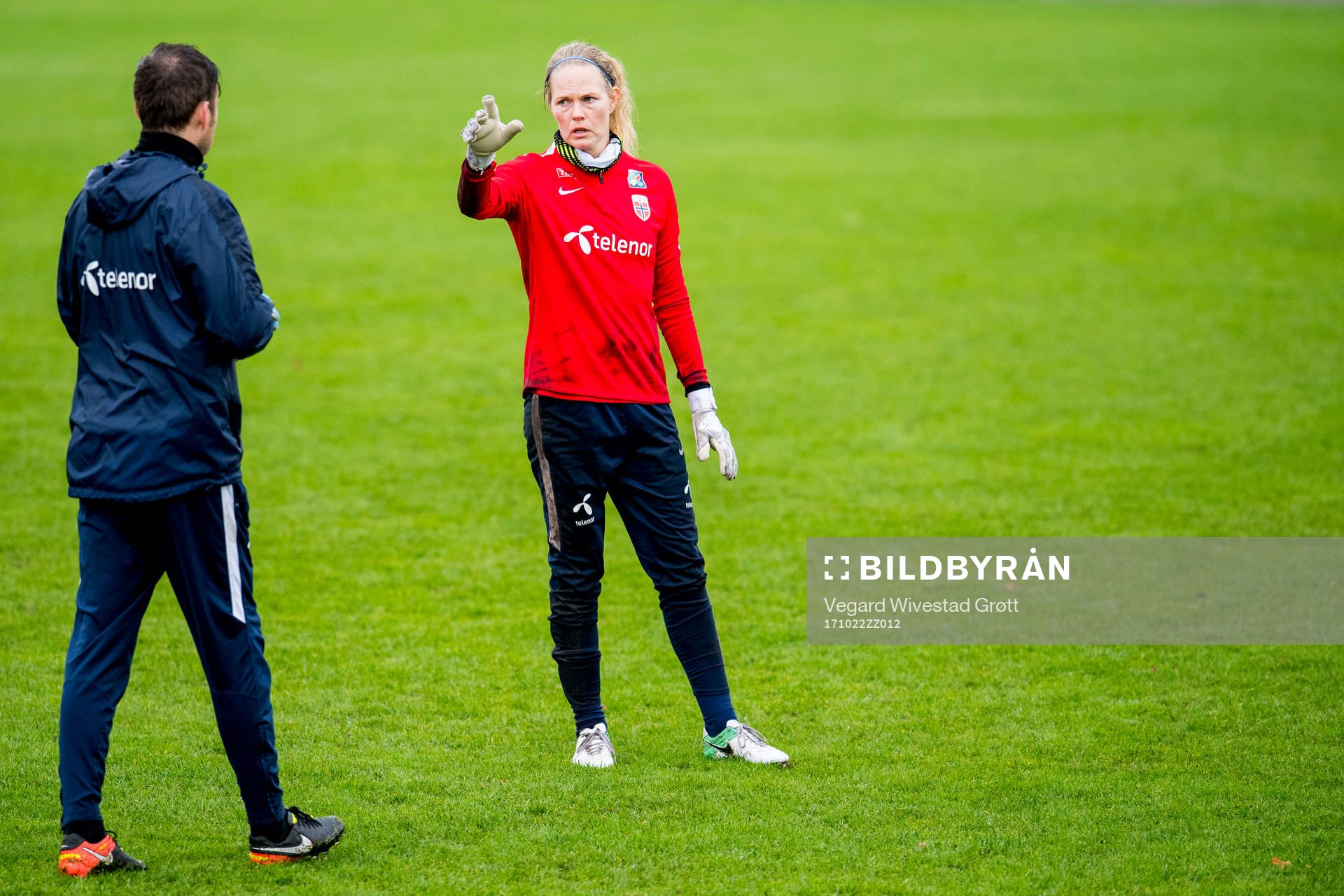 Goalkeeper Ingrid Hjelmseth of Norway talks to Roger
