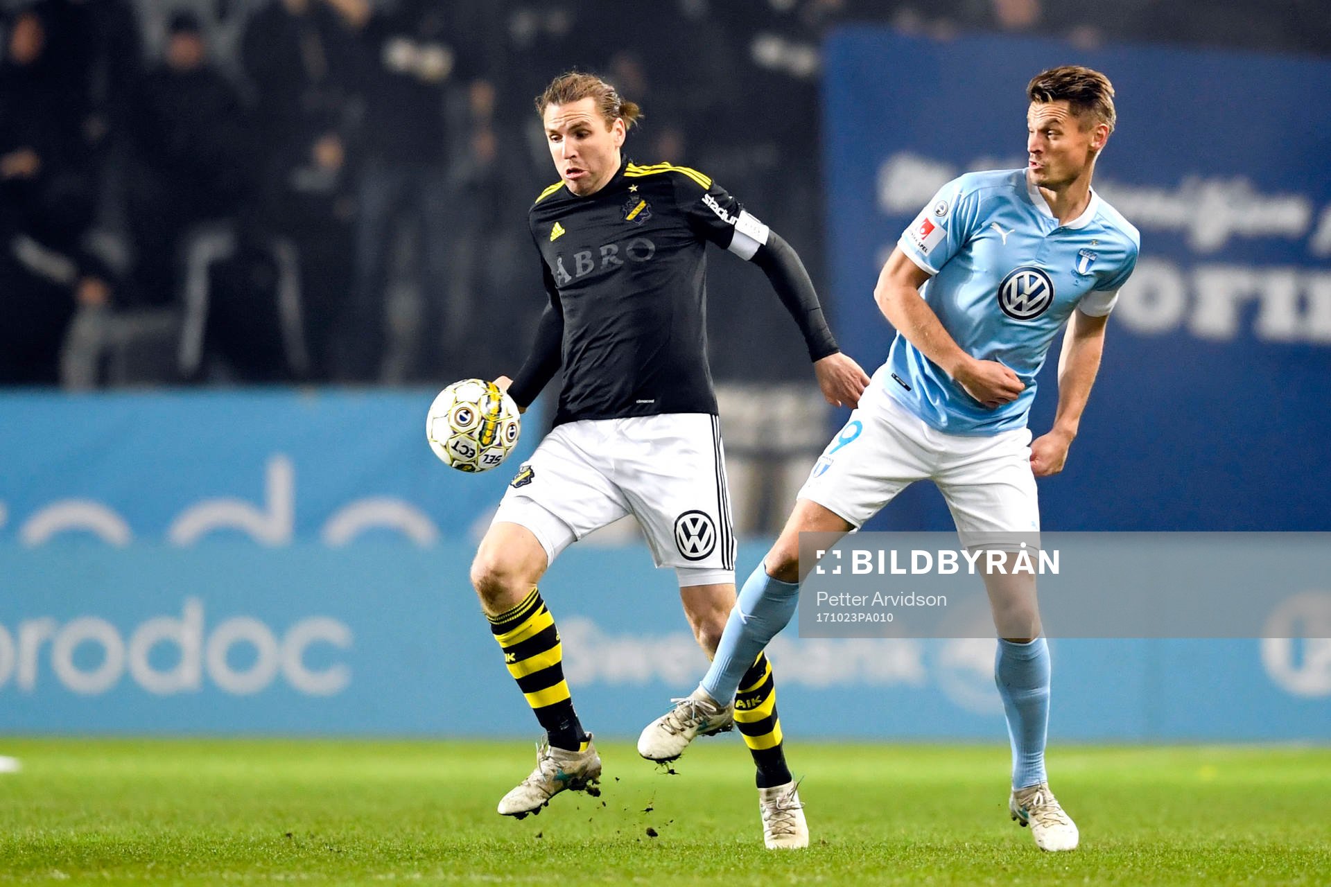 s Nils-Eric Johansson och Malmö FFs Markus Rosenberg