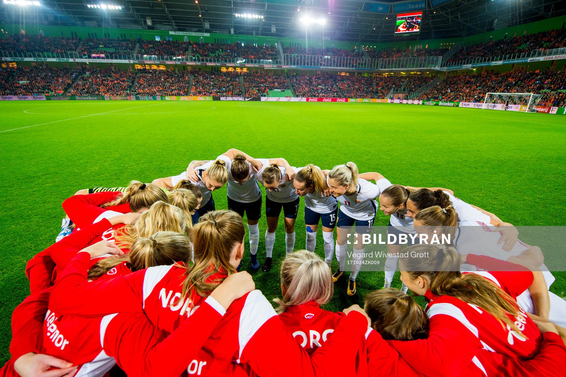 Norway gather in a circle
