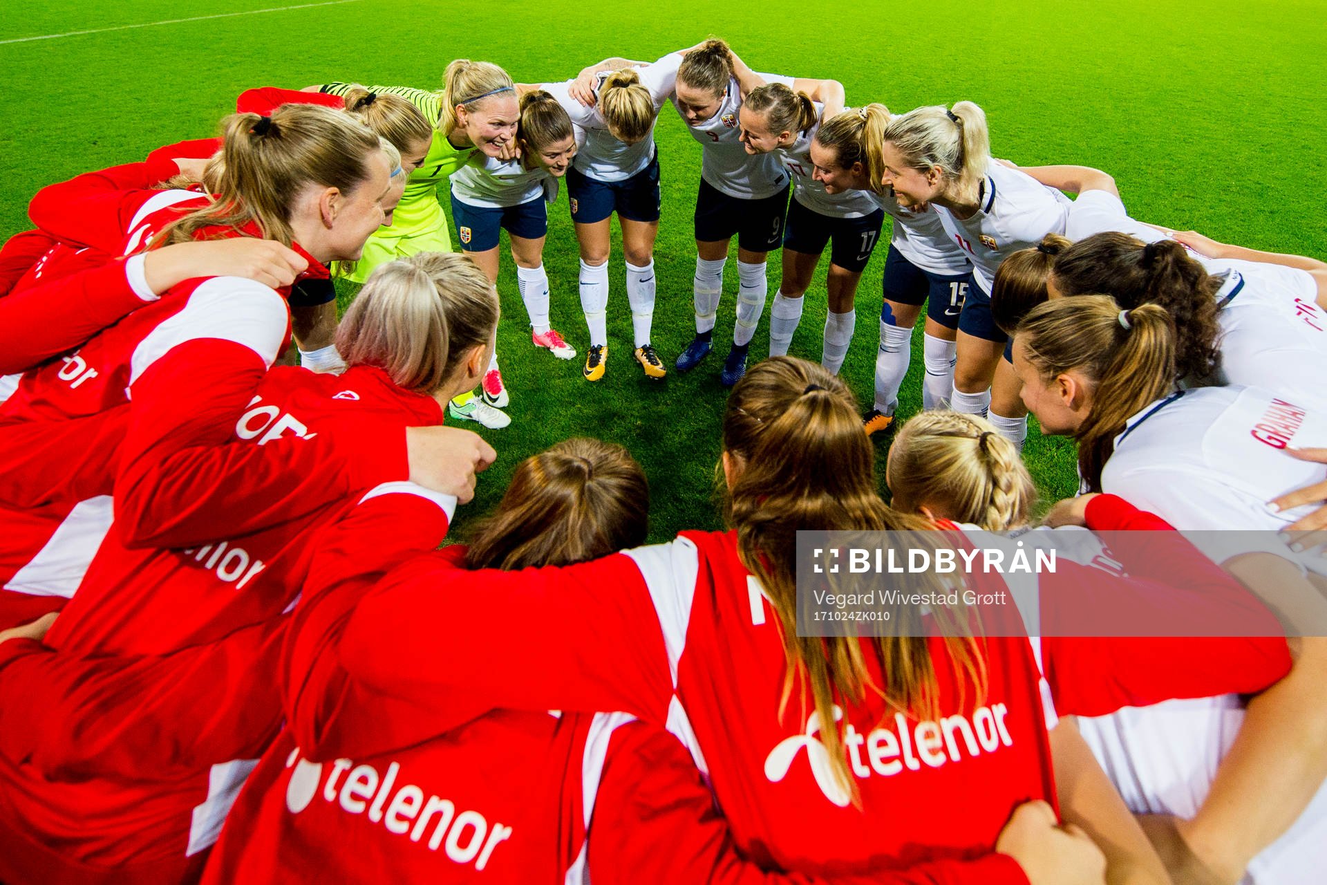 Norway gather in a circle
