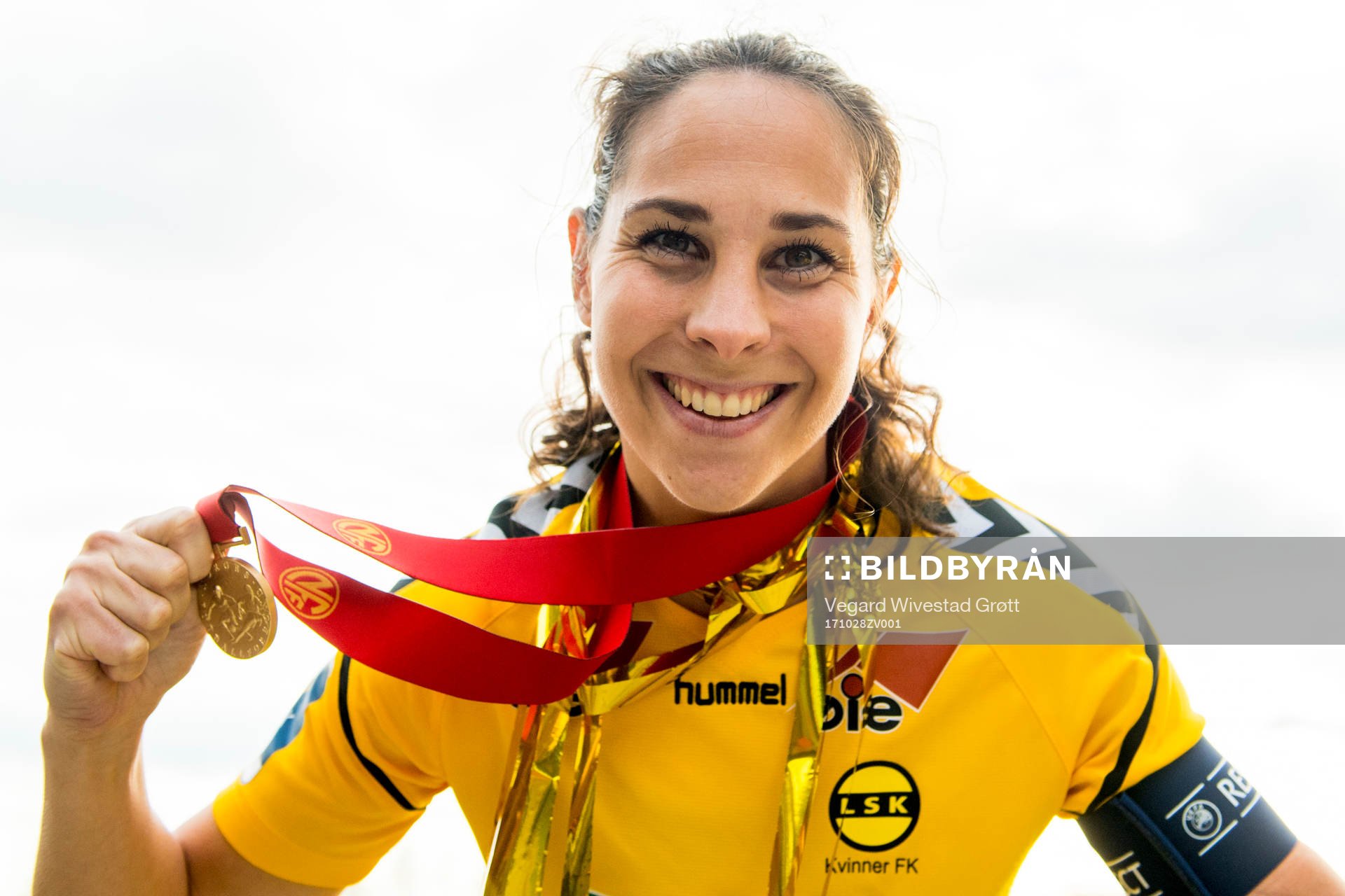 Ingrid Moe Wold of LSK Kvinner poses with the gold medal