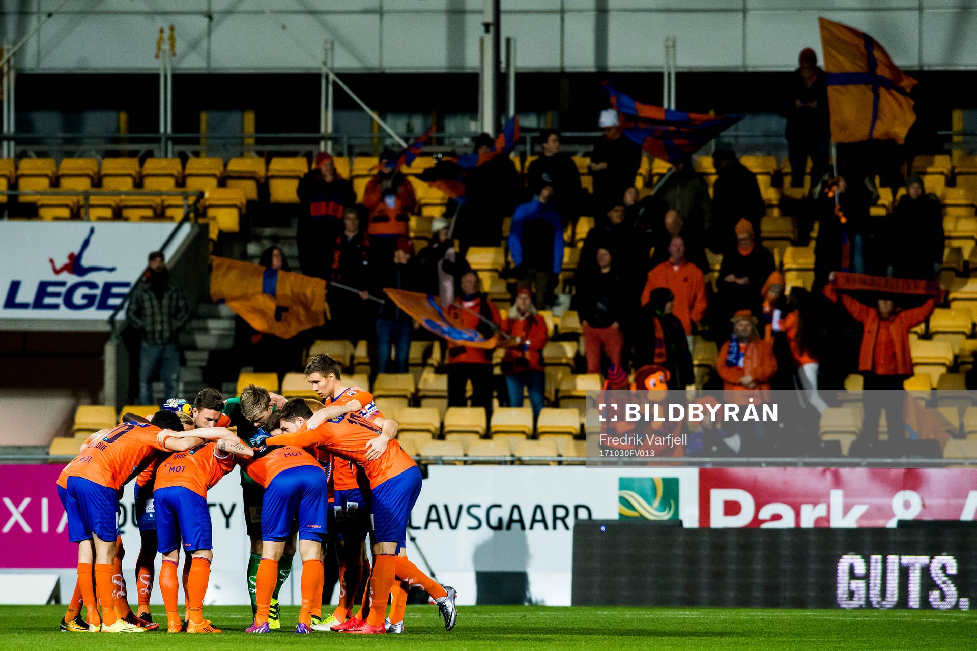 The Aalesund players gather in a ring