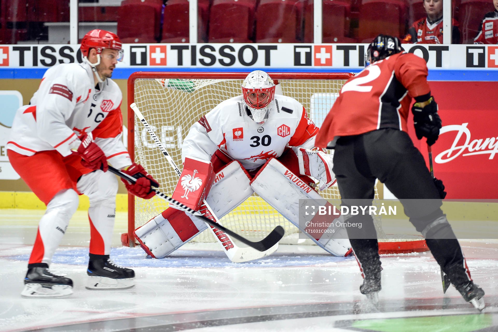 Lars Bryggman of Malmö Redhawks and Lukas Krajicek and