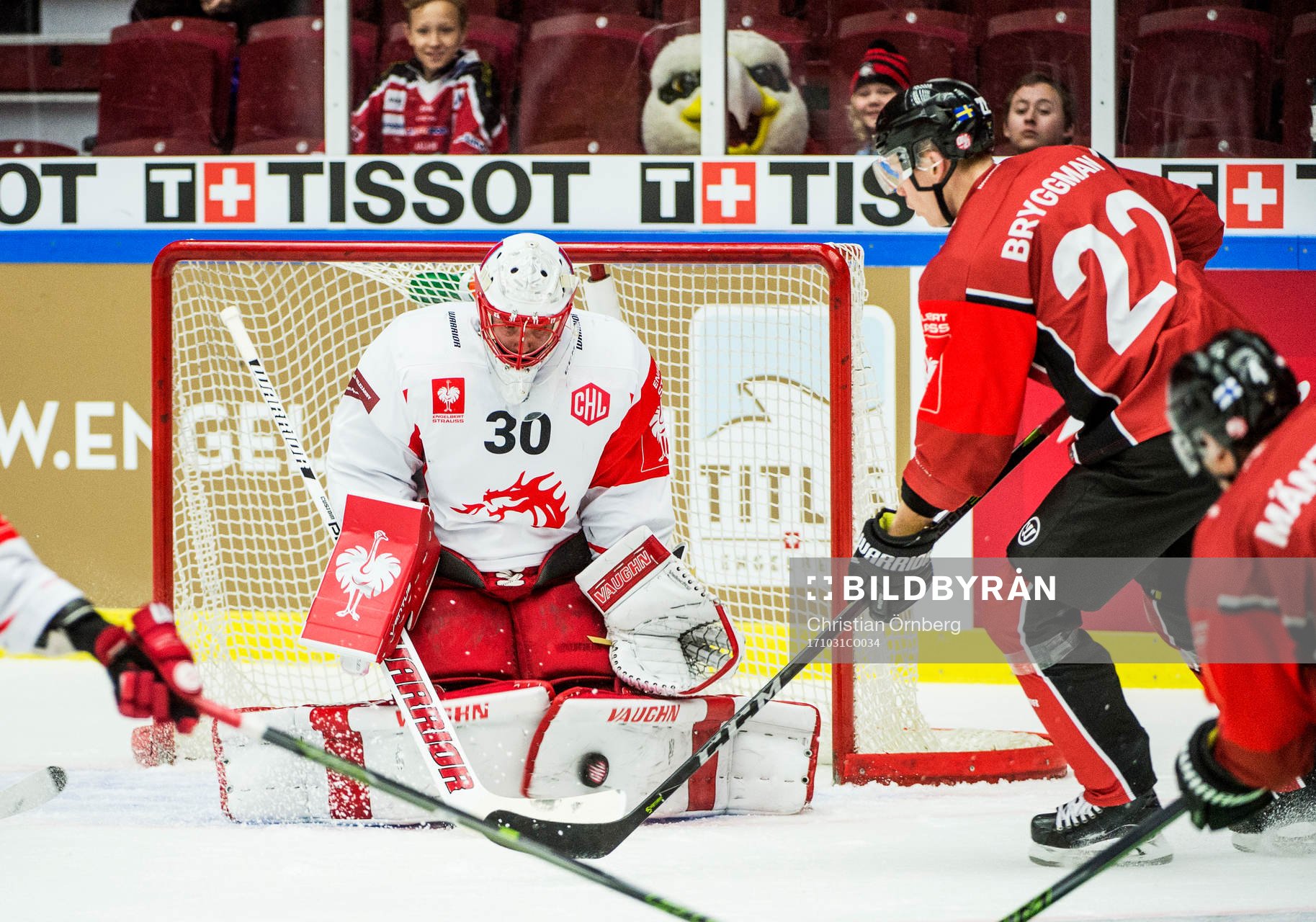Lars Bryggman of Malmö Redhawks and goalkeeper Simon