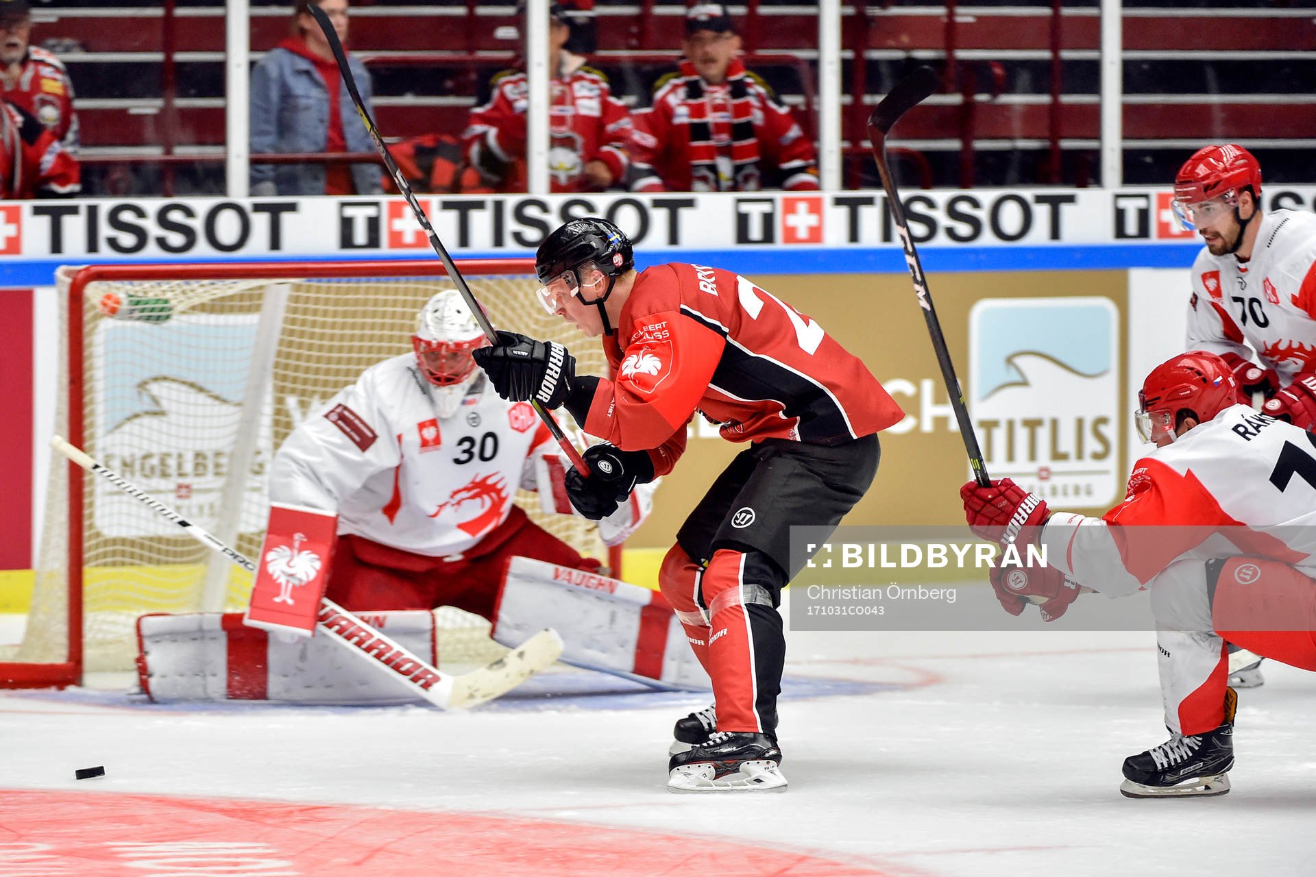 Lars Bryggman of Malmö Redhawks and goalkeeper Simon
