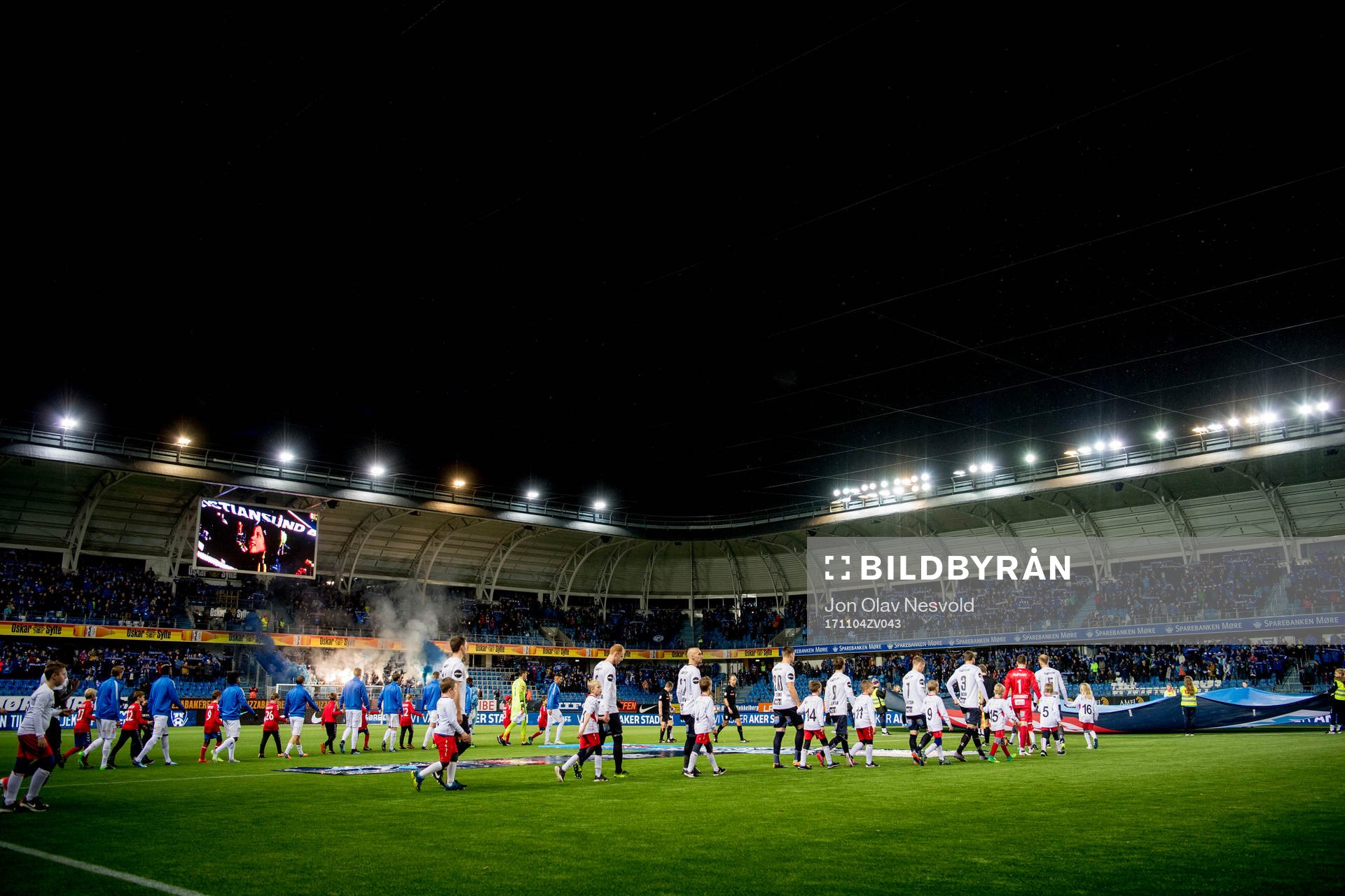 Players enter the pitch