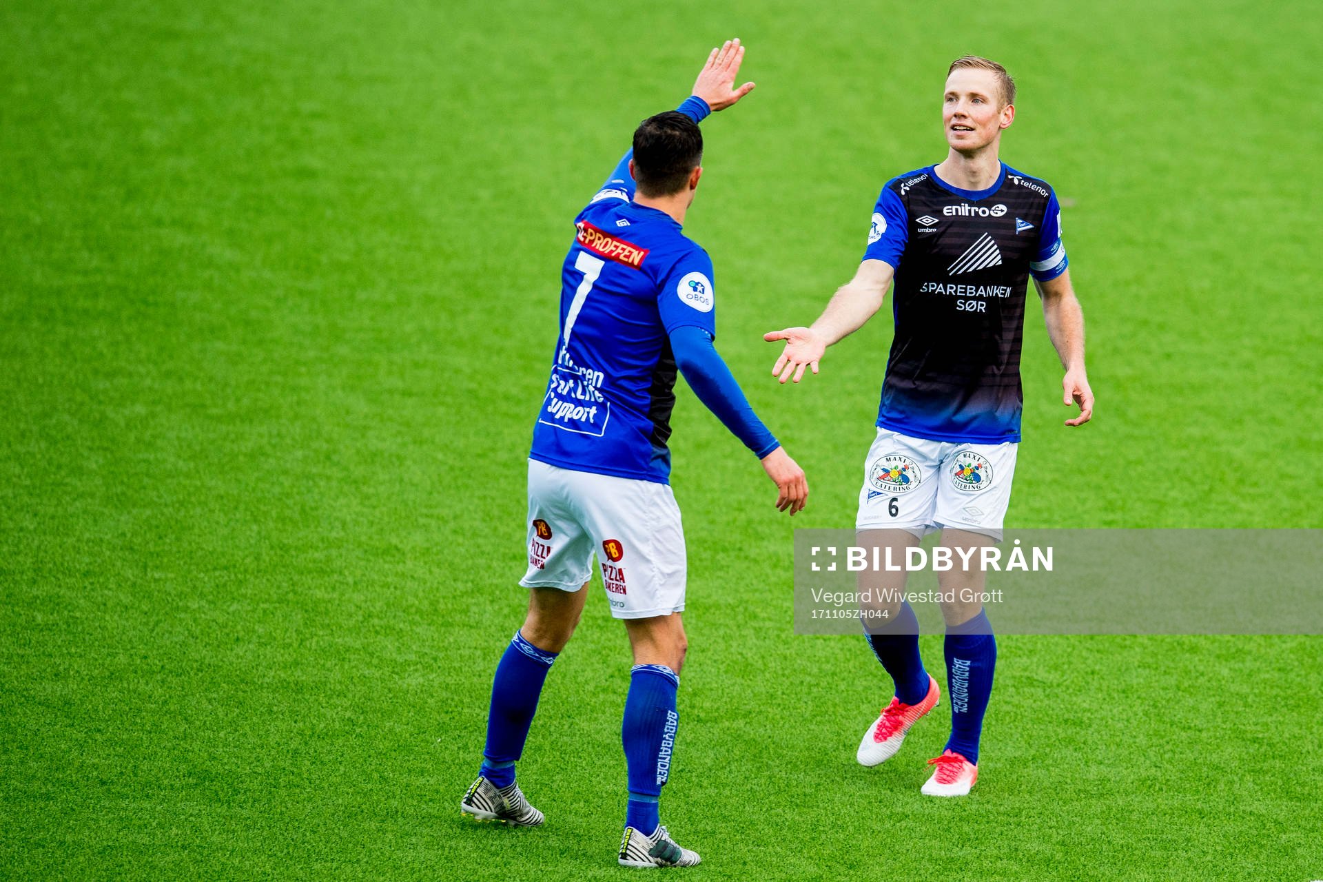Simon Andreas Larsen of Start celebrates with teammate Niels Vorthoren after scoring 0-1 during the Obos-ligaen match between Åsane and Start on November 5, 2017 in Åsane.