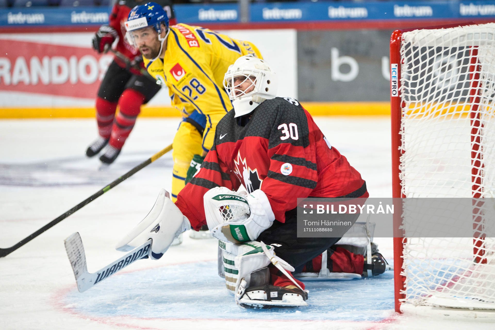 Dick Axelsson #28, Sweden, Ben Scrievens #30, Canada