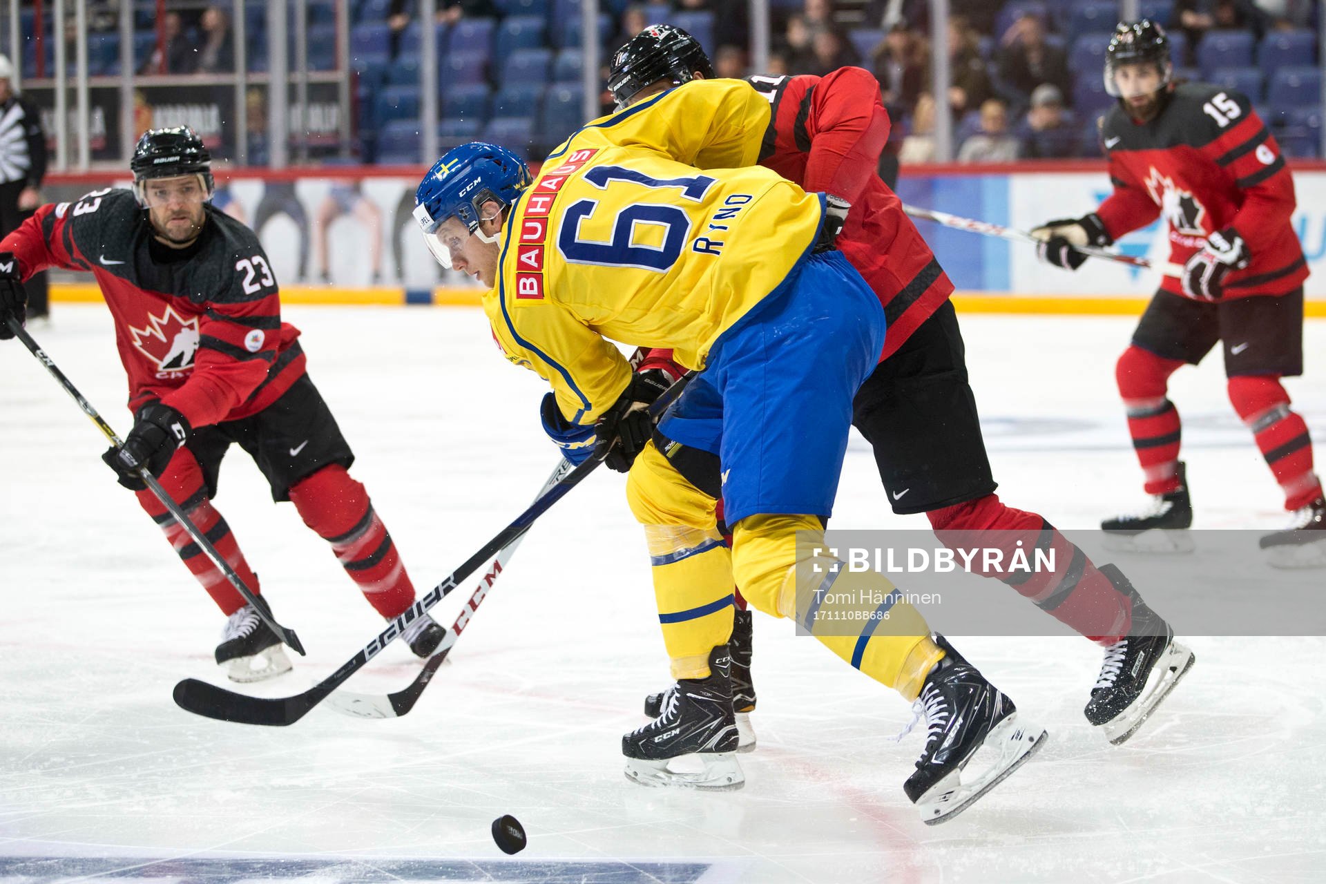 Andrew Ebbett #23, Canada, Johan Ryno #61, Sweden, Jesse