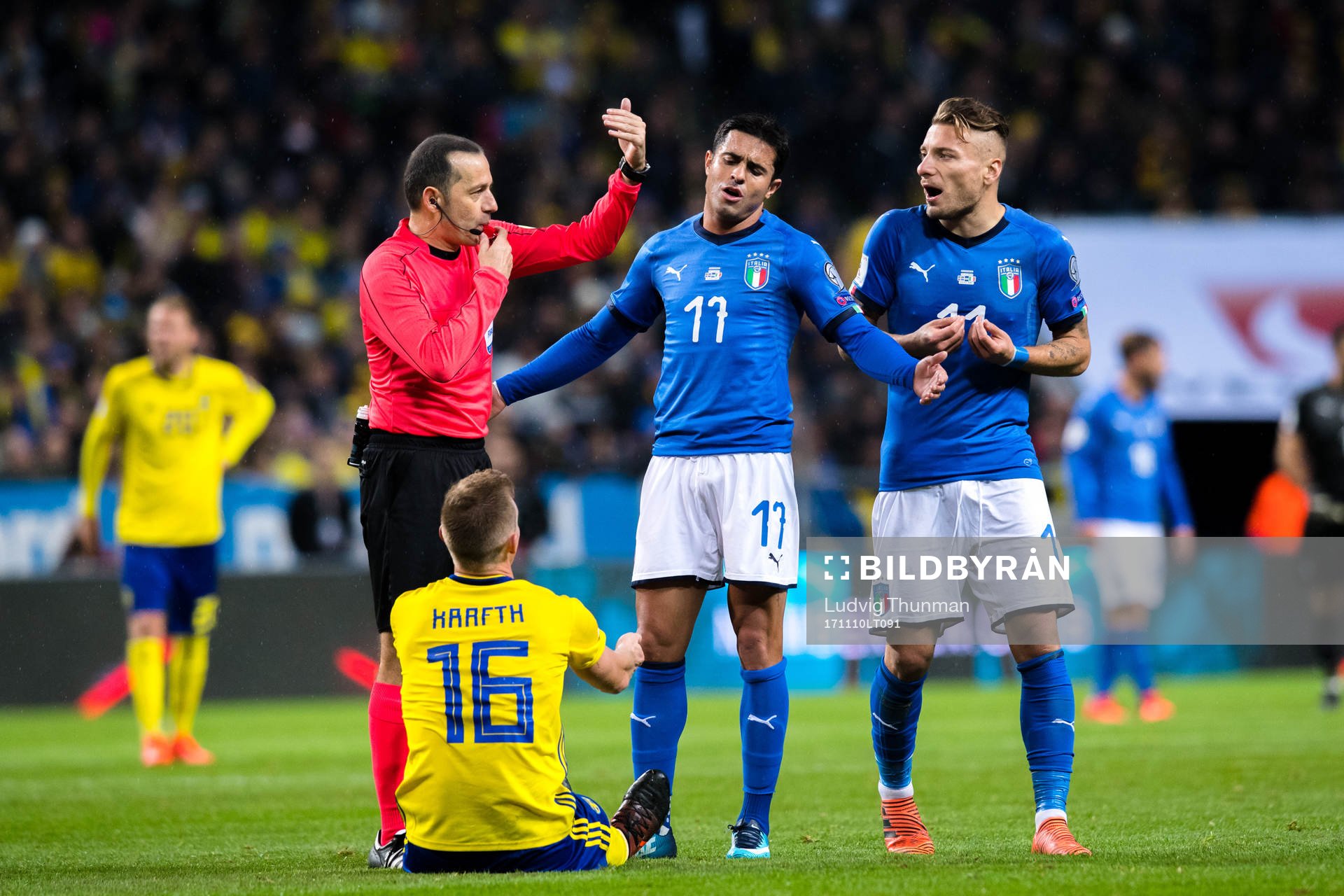 Italiens Ciro Immobile och Sveriges Emil Krafth