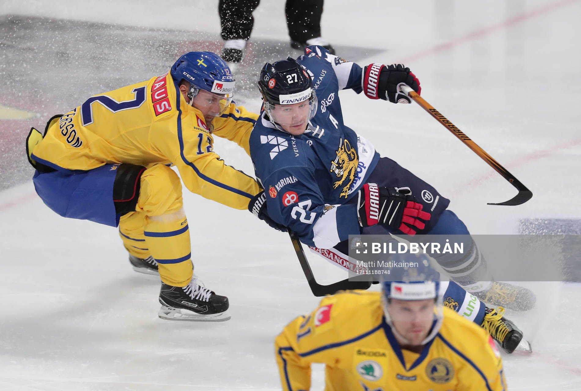Fredrik Pettersson #12, Sweden and Petri Kontiola #27,