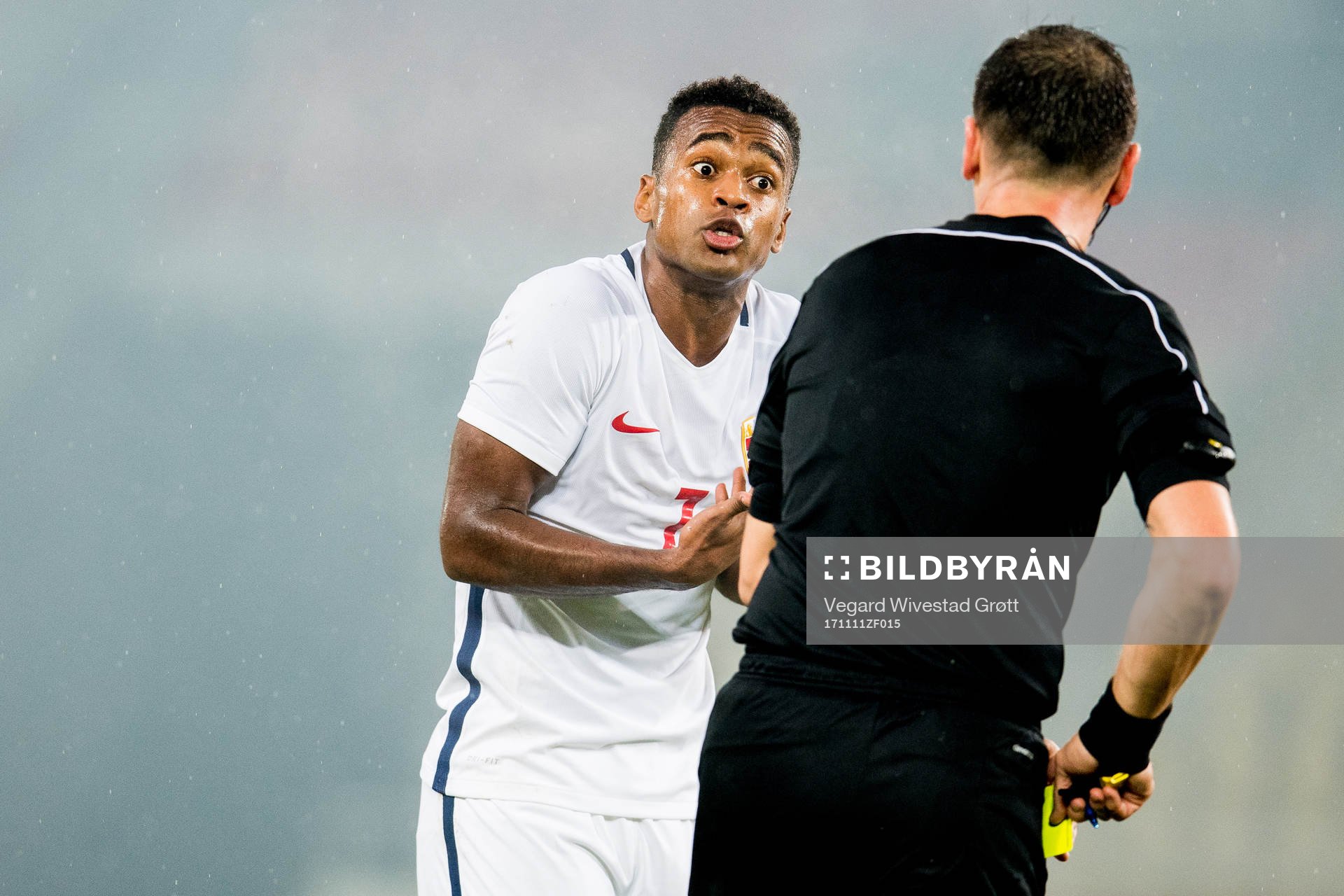 Ola Kamara of Norway receives a yellow card