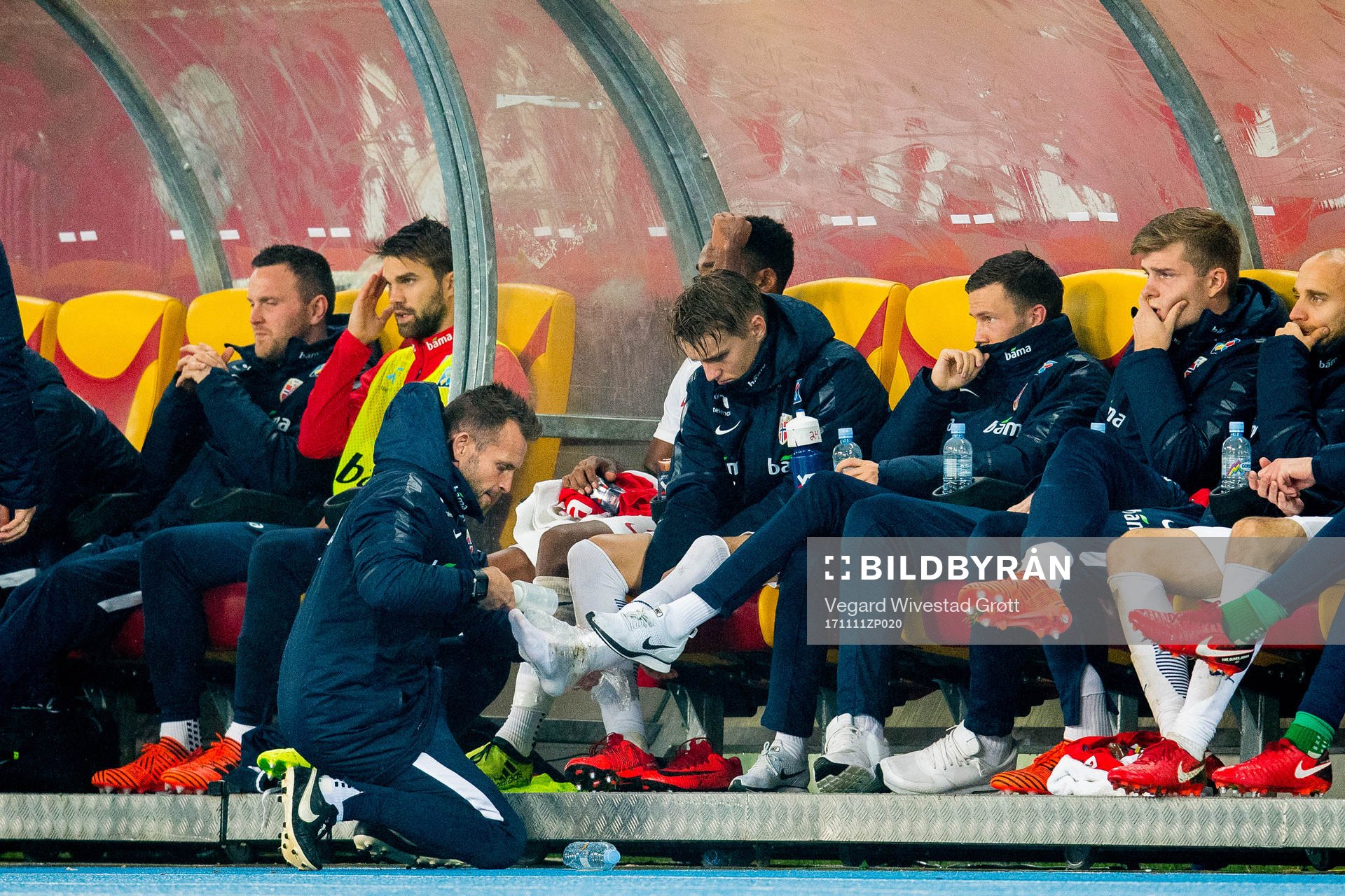 Martin Ødegaard of Norway receives treatment by manual