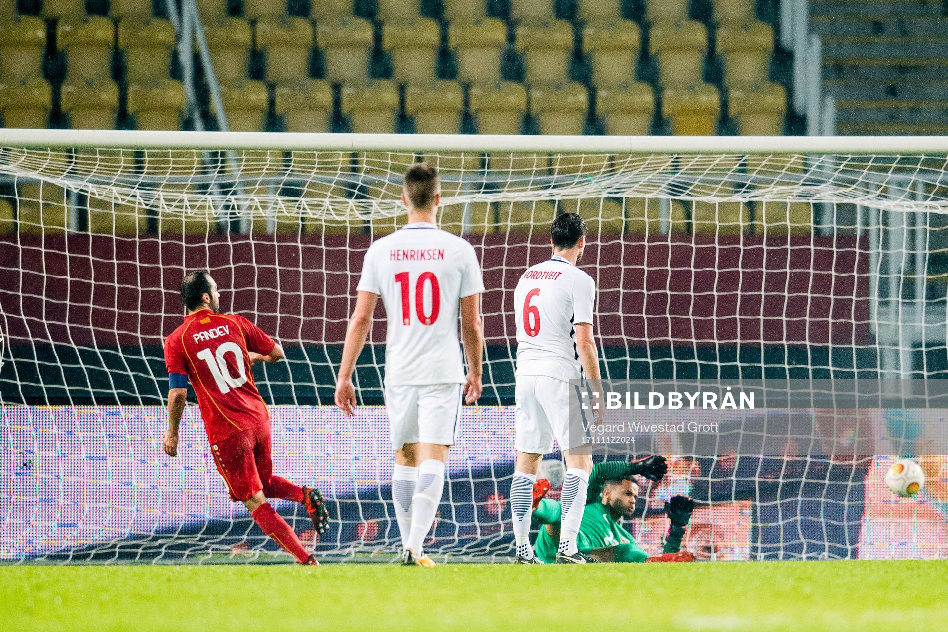 Goran Pandev of Macedonia scores 1-0 behind goalkeeper Sten Grytebust of Norway during the international friendly match between Macedonia and Norway on November 11, 2017 in Skopje.