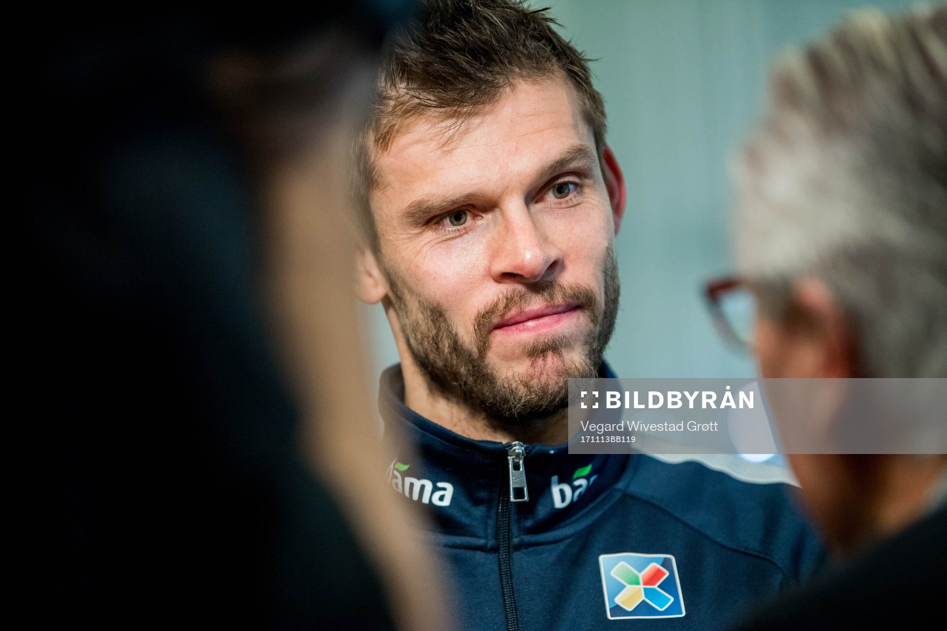 Goalkeeper Rune Almenning Jarstein of Norway talks to journalist Davy Wathne of TV 2 during a press event on November 13, 2017 in Bratislava.