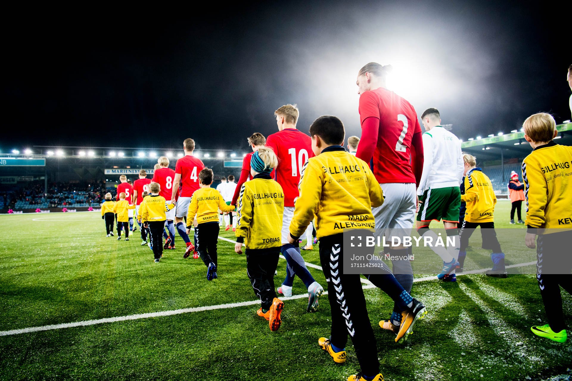 Martin Ødegaard and Julian Ryerson of Norway enter the