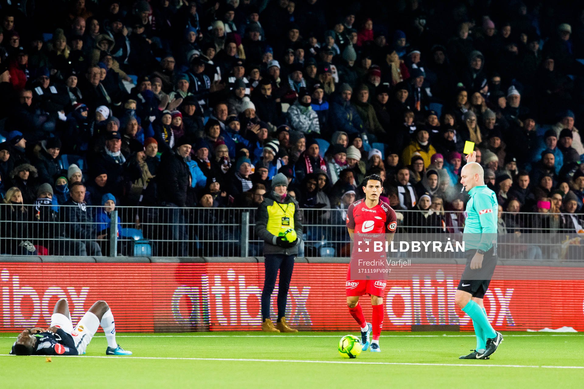 Deyver Vega of Brann is shown the yellow card by Dag Vidar