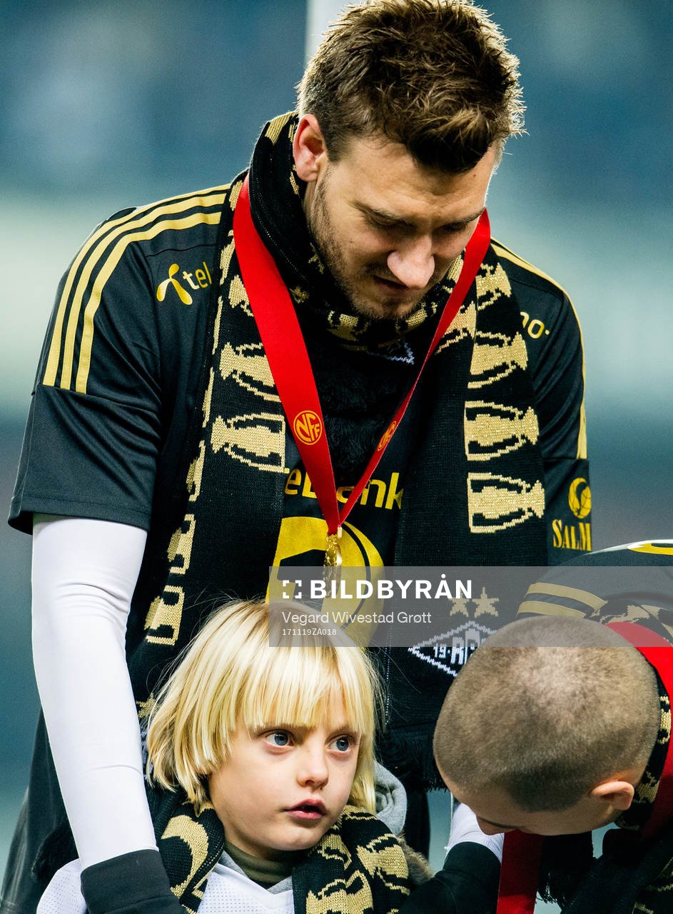 Nicklas Bendtner of Rosenborg together with his son