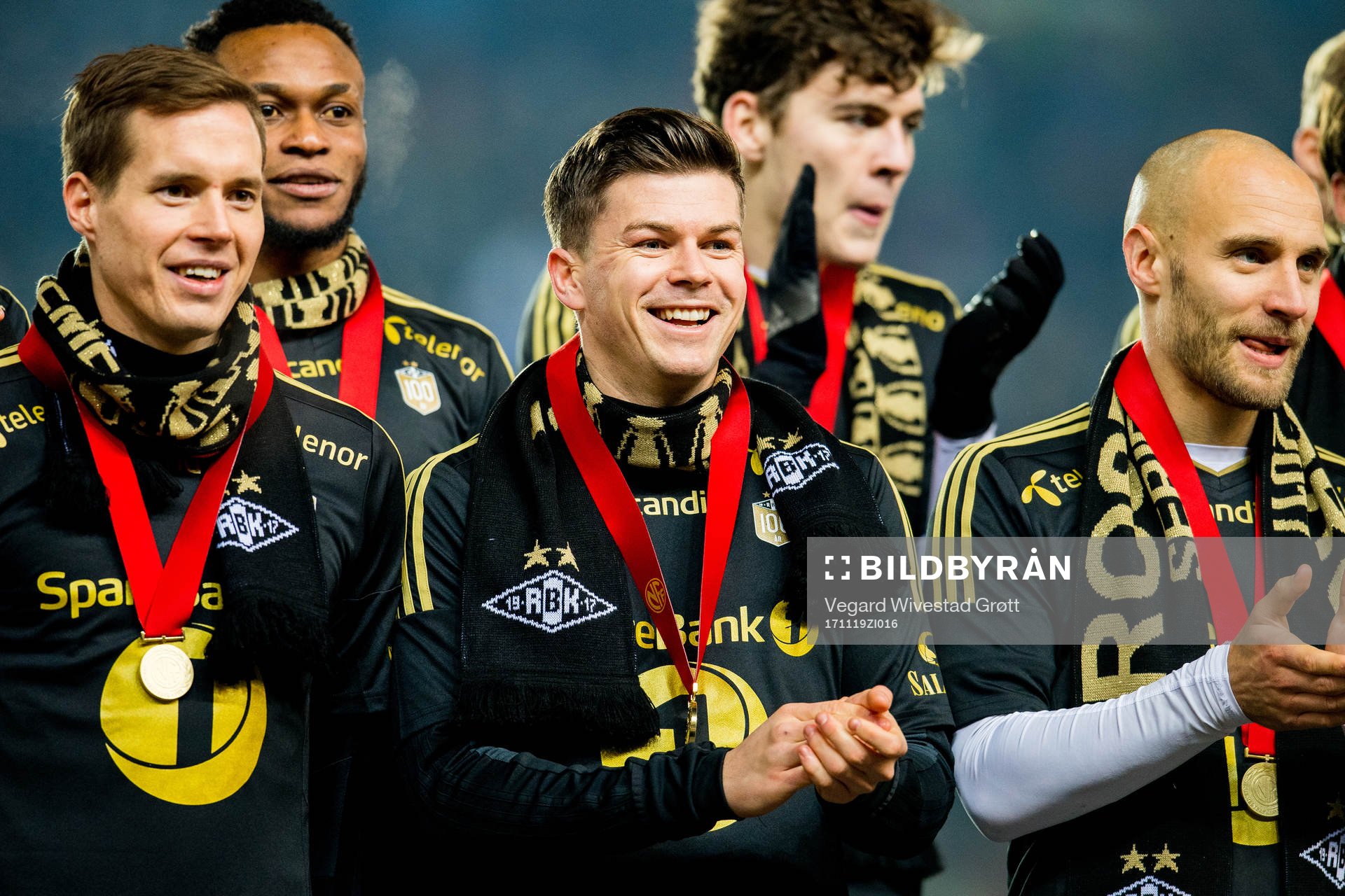 Anders Konradsen, Pål André Helland and Tore Reginiussen of Rosenborg with the winner's medals after the Eliteserien match between Rosenborg and Viking on November 19, 2017 in Trondheim.