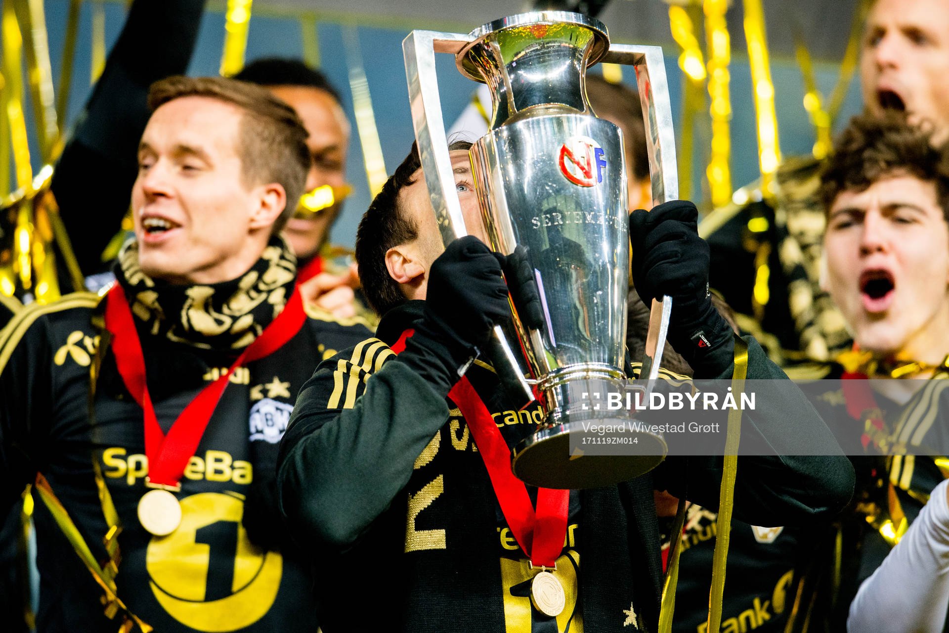 Mike Jensen of Rosenborg kisses the league trophy after the Eliteserien match between Rosenborg and Viking on November 19, 2017 in Trondheim.