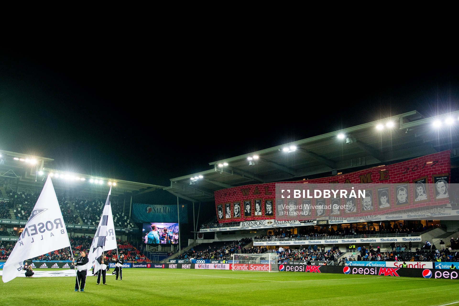 Fans of Rosenborg with a banner