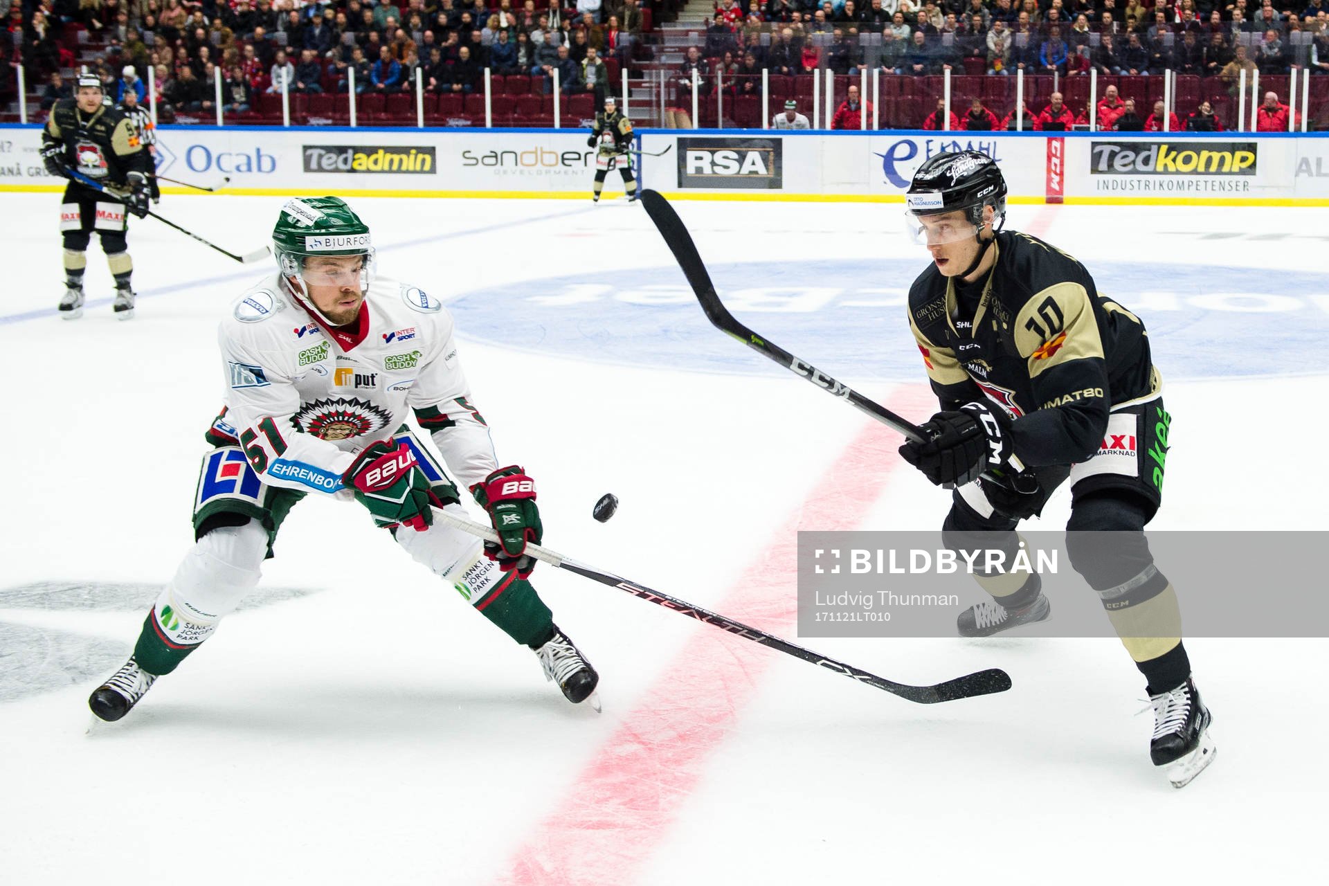 Malmö Redhawks Robin Alvarez och Frölundas Mats Rosseli