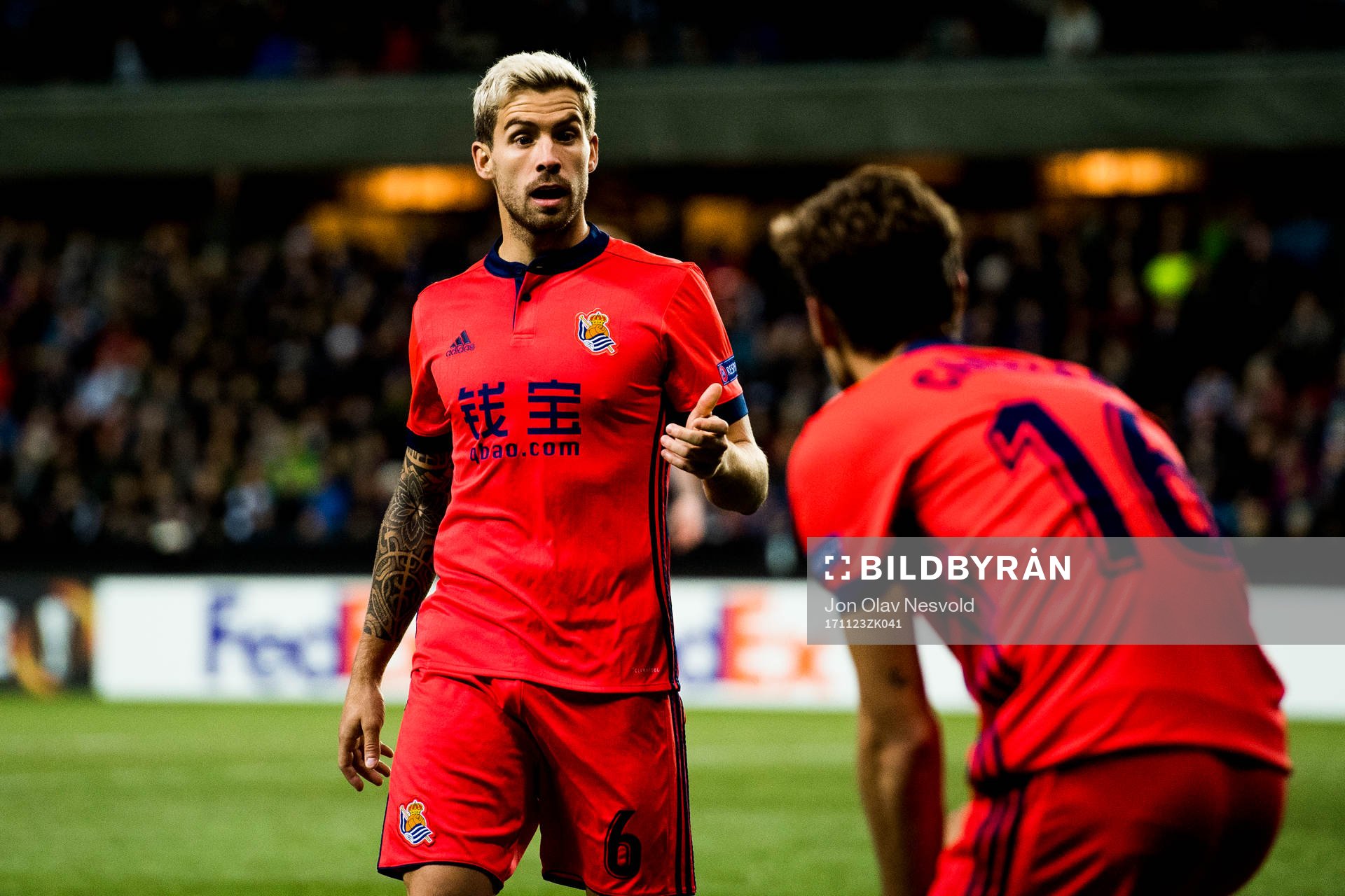 Inigo Martinez and Sergio Canales of Real Sociedad