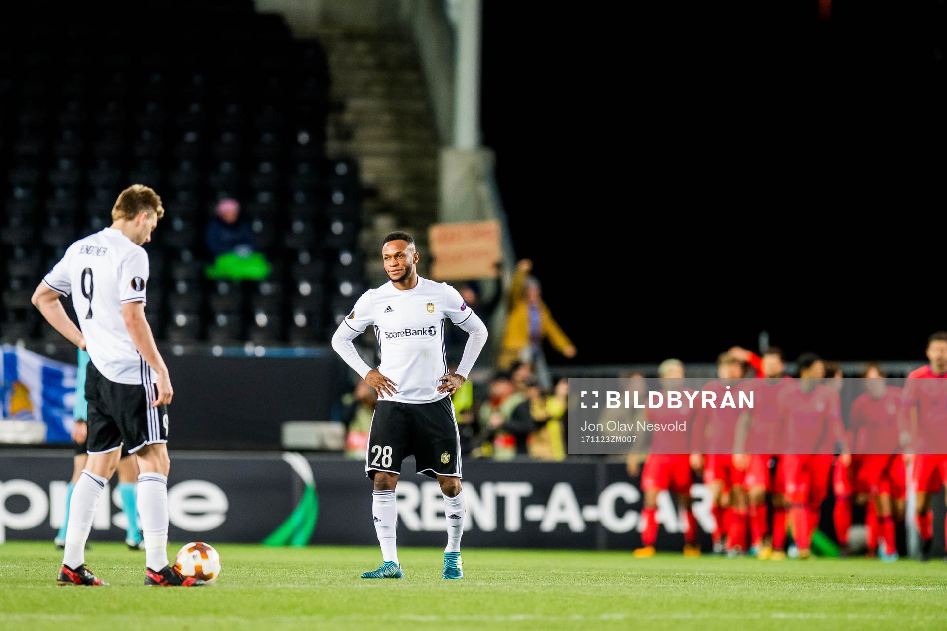 Nicklas Bendtner and Samuel Adegbenro of Rosenborg look