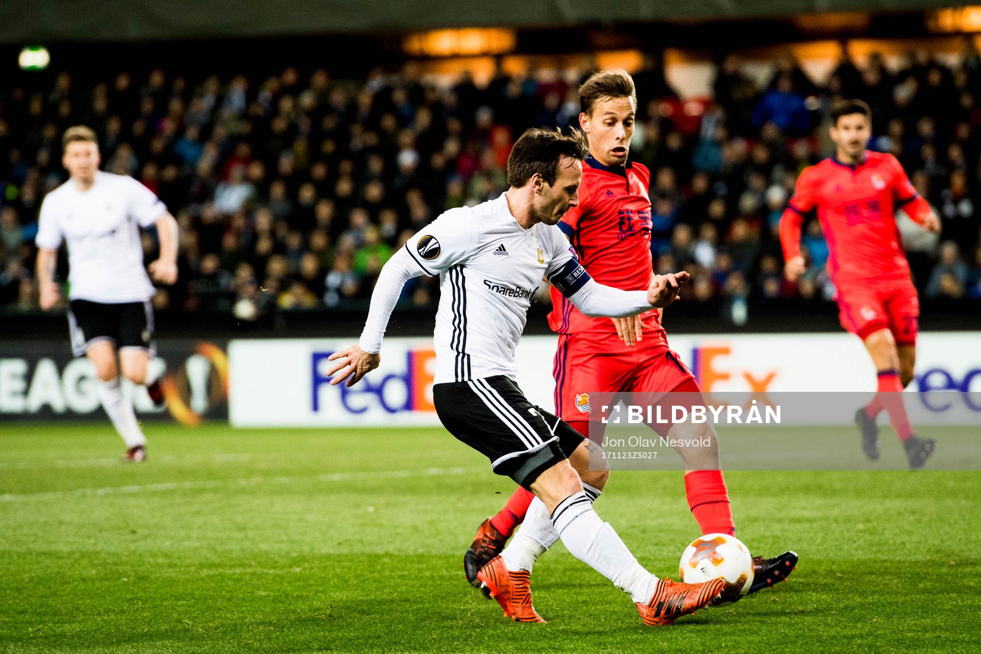 Mike Jensen of Rosenborg and Sergio Canales of Real Sociedad