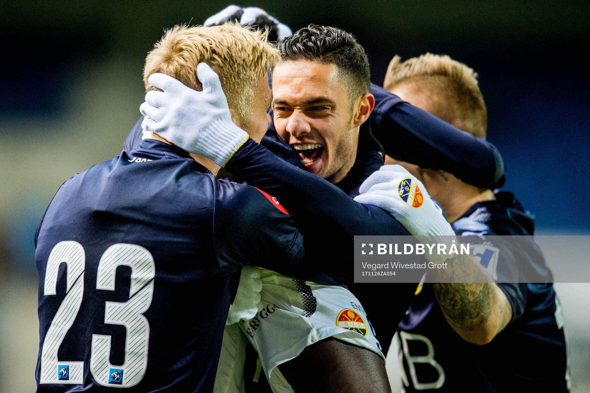 Tokmac Nguen of Strømsgodset (partly hidden) celebrates