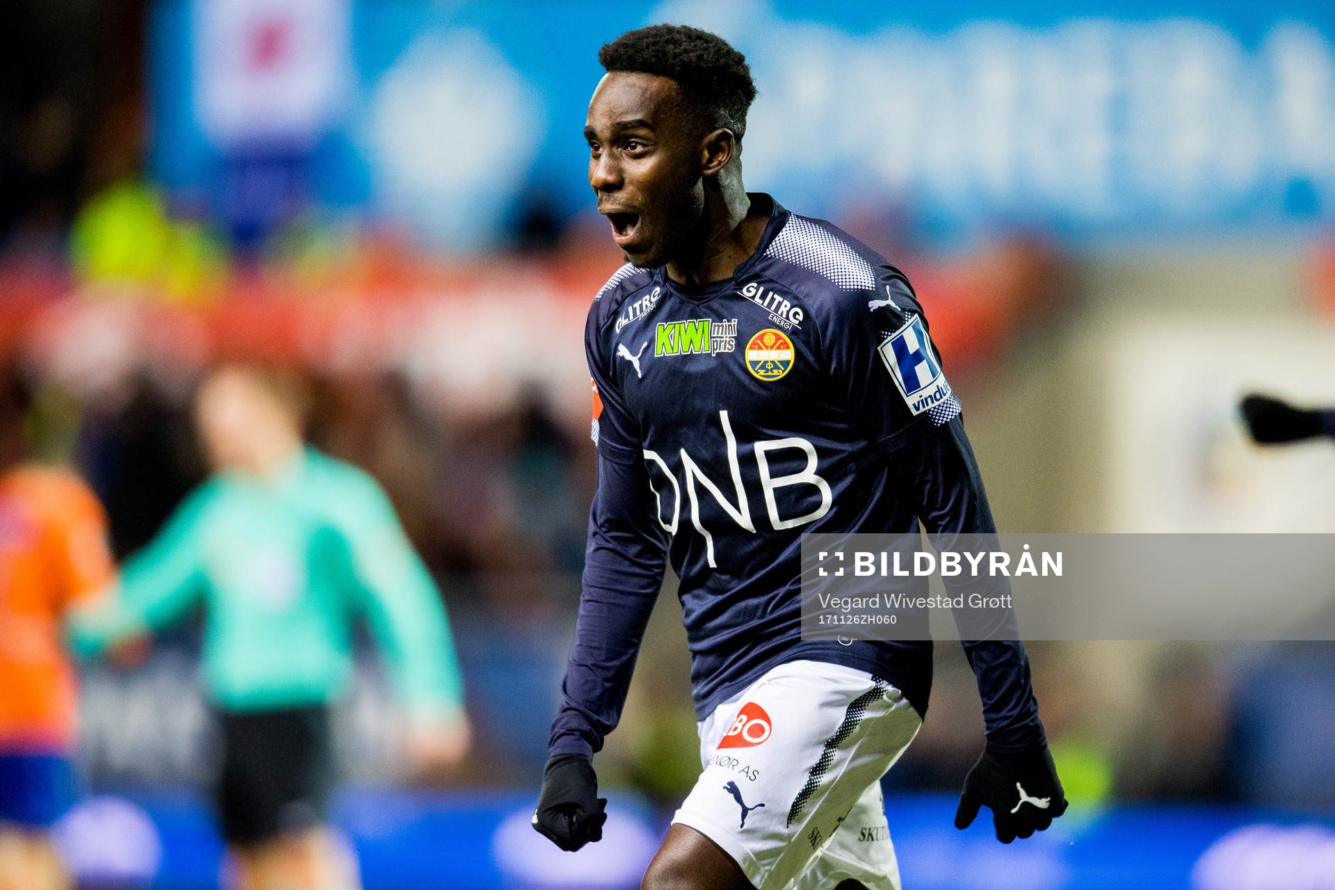 Tokmac Nguen of Strømsgodset celebrates scoring 2-2