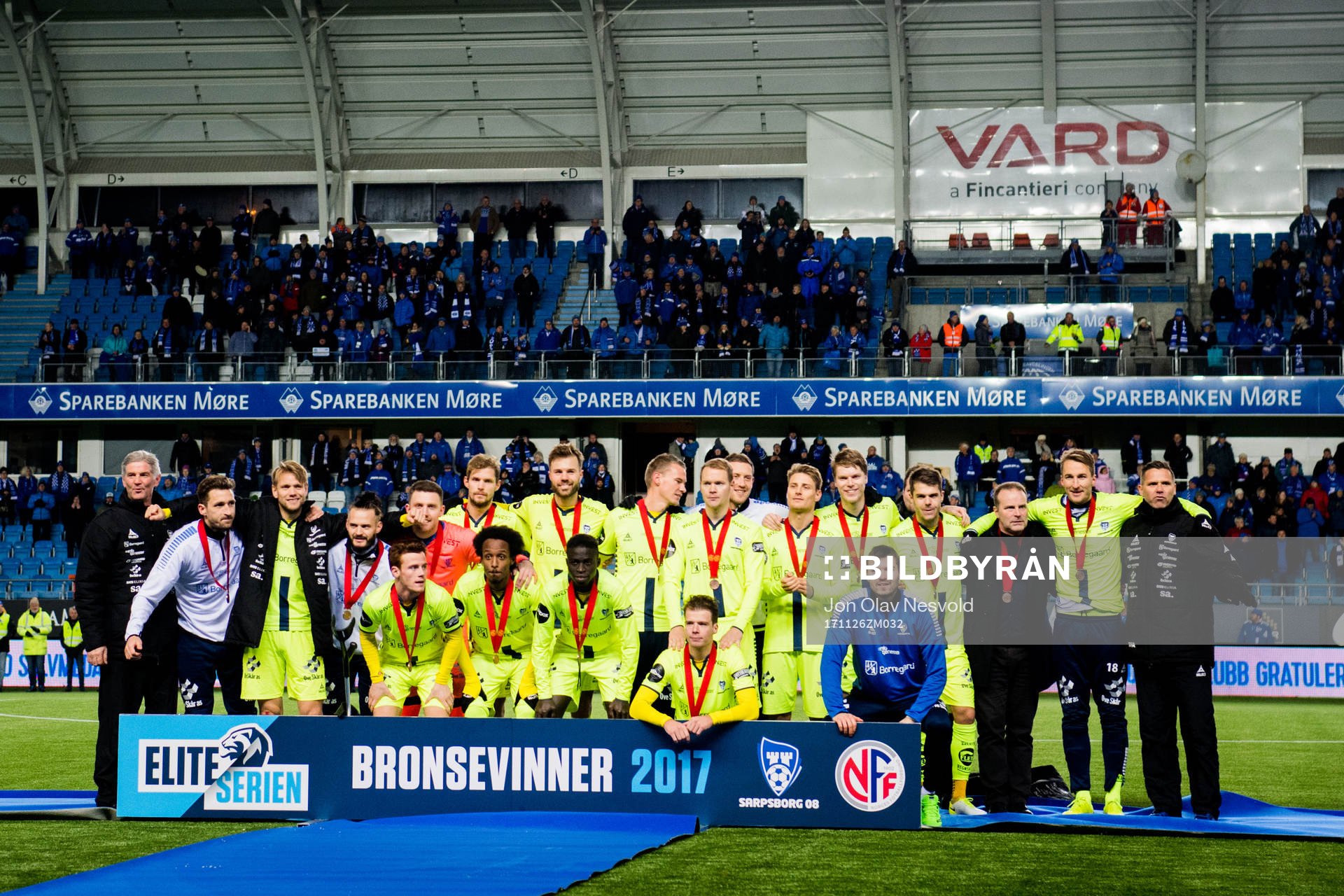 The players of Sarpsborg celebrate with their bronze medals after the Eliteserien match between Molde and Sarpsborg 08 on November 26, 2017 in Molde.