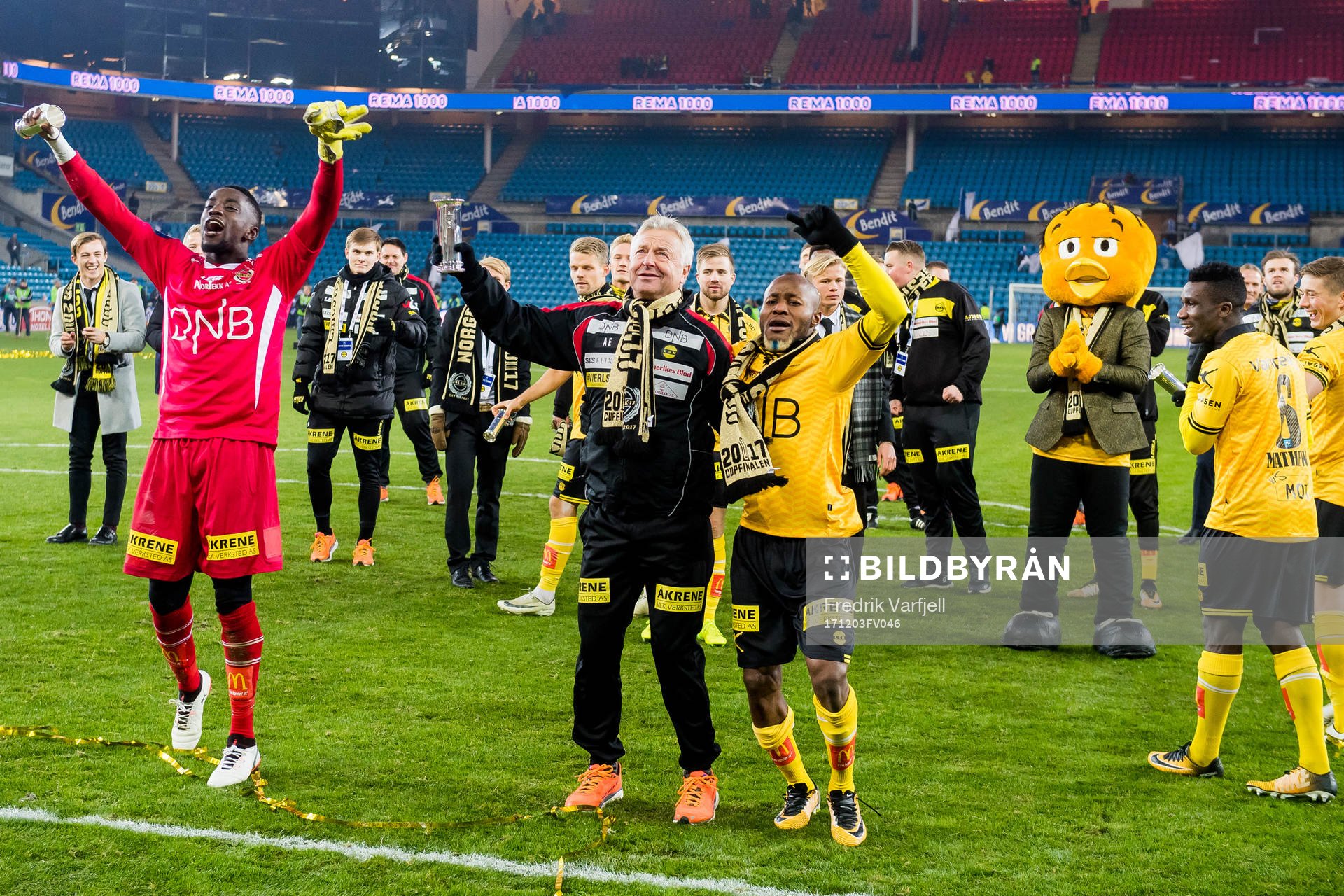 Goalkeeper Arnold Origi, Arne Erlandsen, head coach of Lillestrøm, and Chigozie Udoji of Lillestrøm  celebrate after the cup final match between Lillestrøm and Sarpsborg 08 on December 3, 2017 in Oslo.