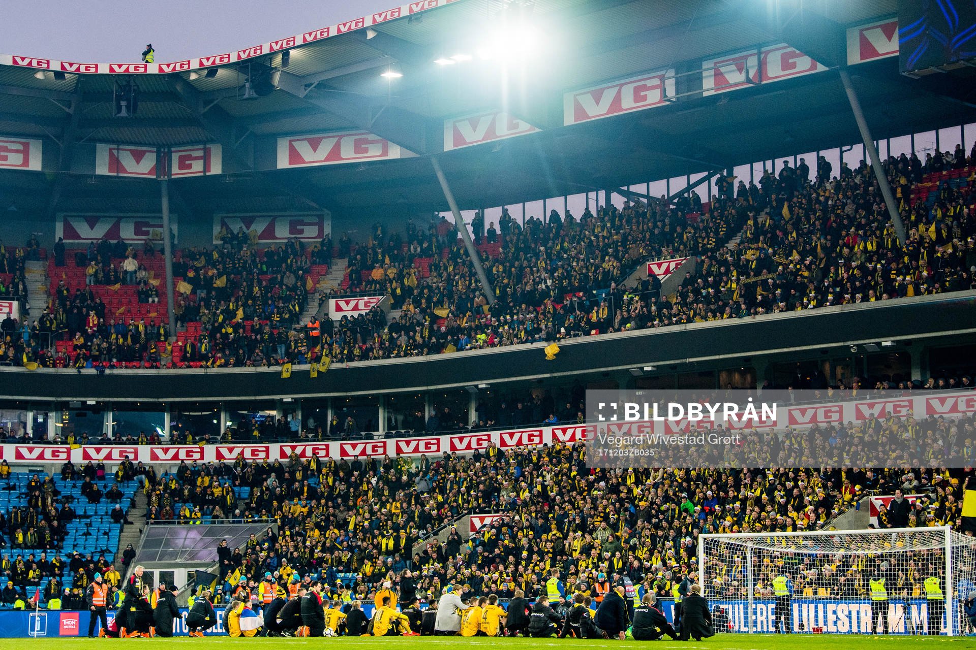Players, staff and fans of Lillestrøm celebrate winning