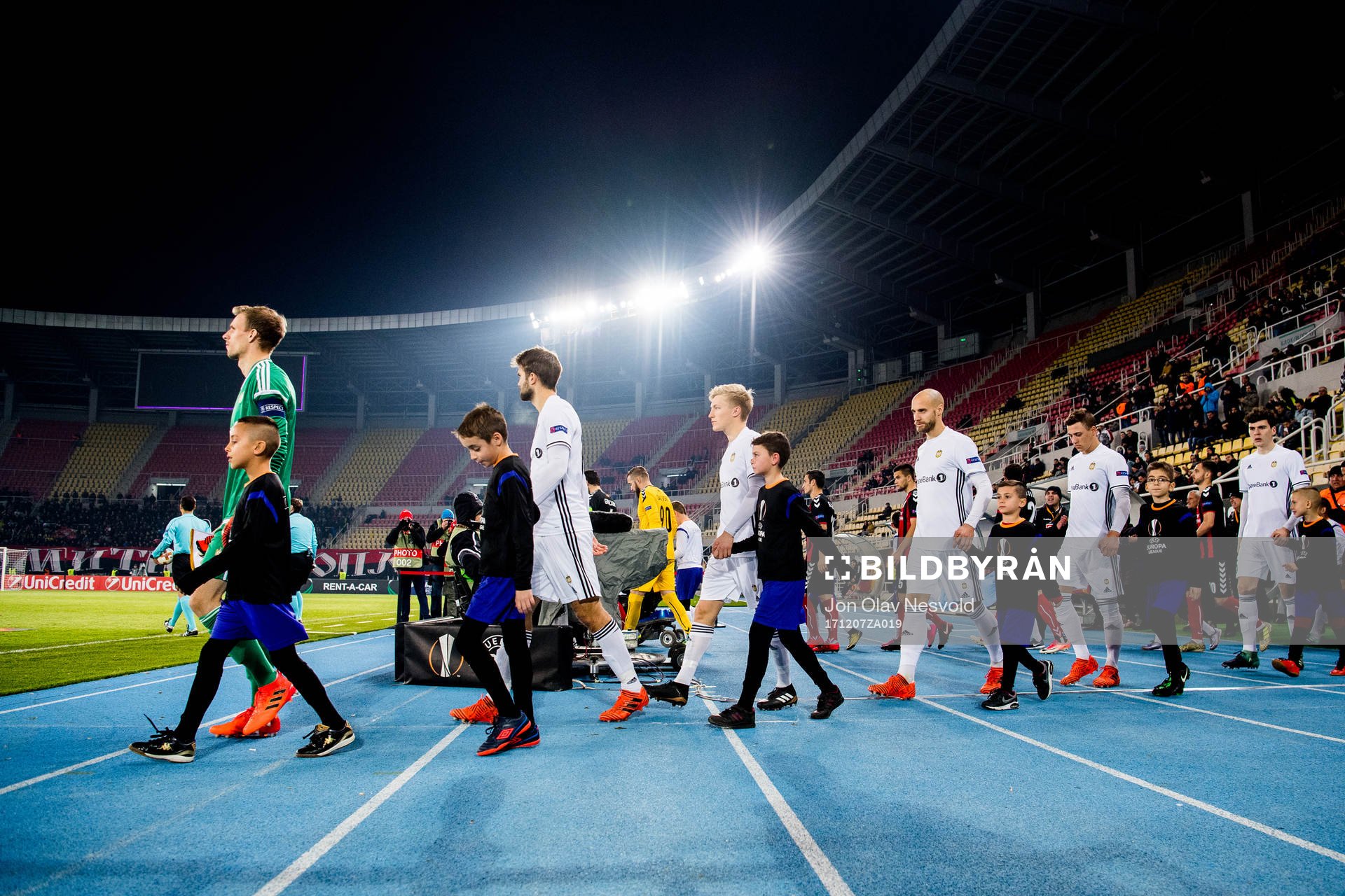 The Rosenborg players enter the pitch